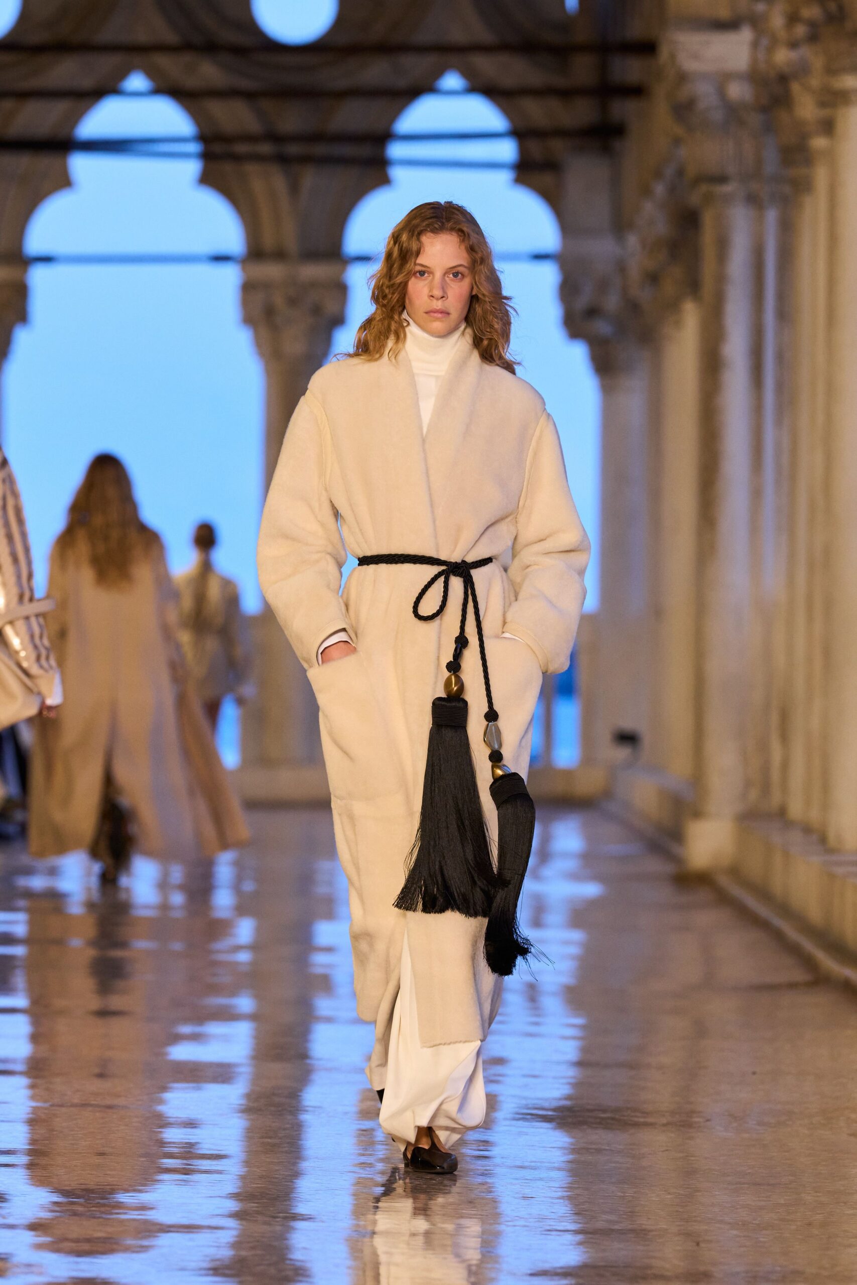 beige wool coat with black bag