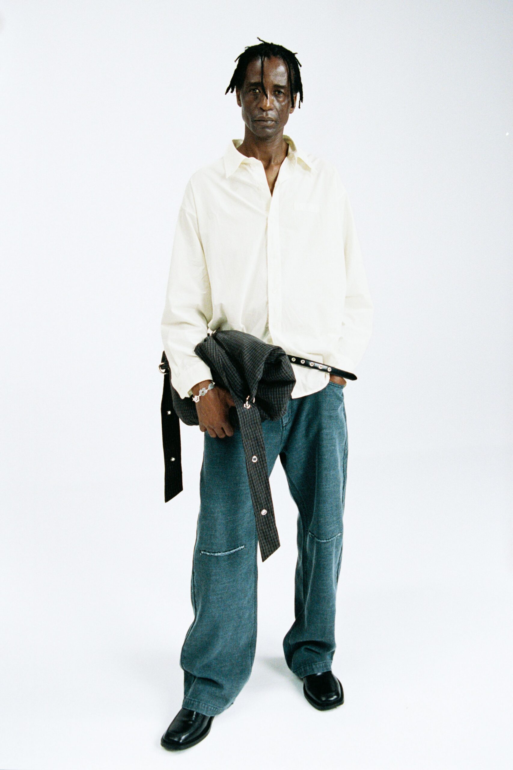 white cotton shirt with blue denim pants