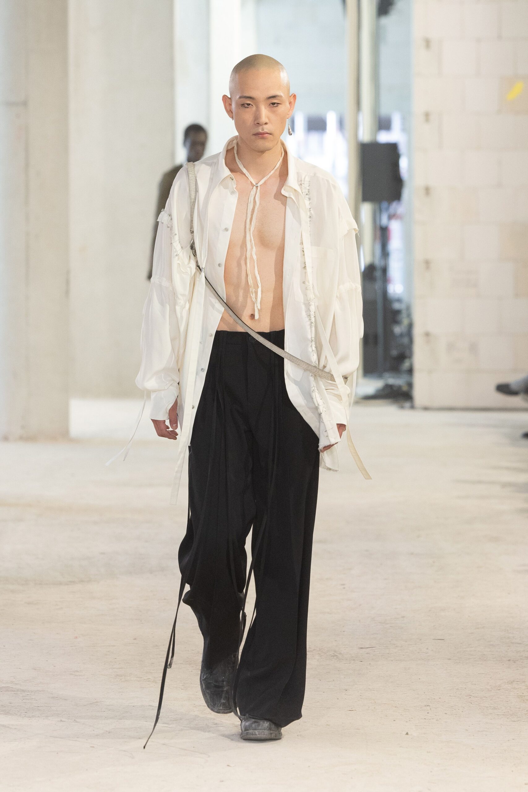 white relaxed shirt black pants