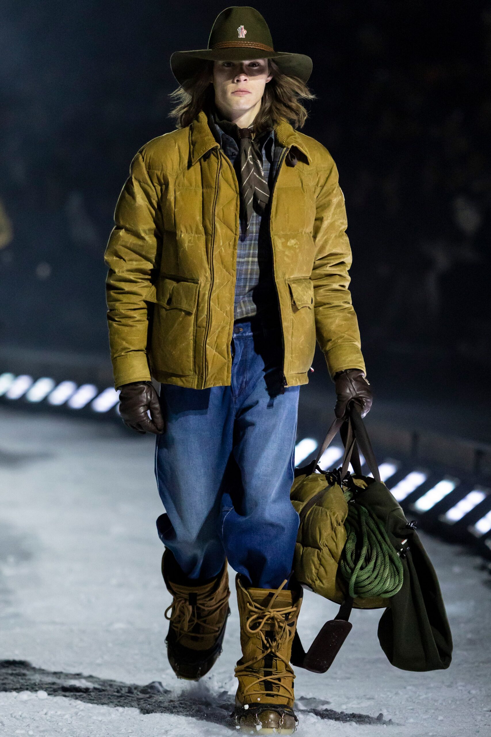 brown jacket with blue shirt and denim pants