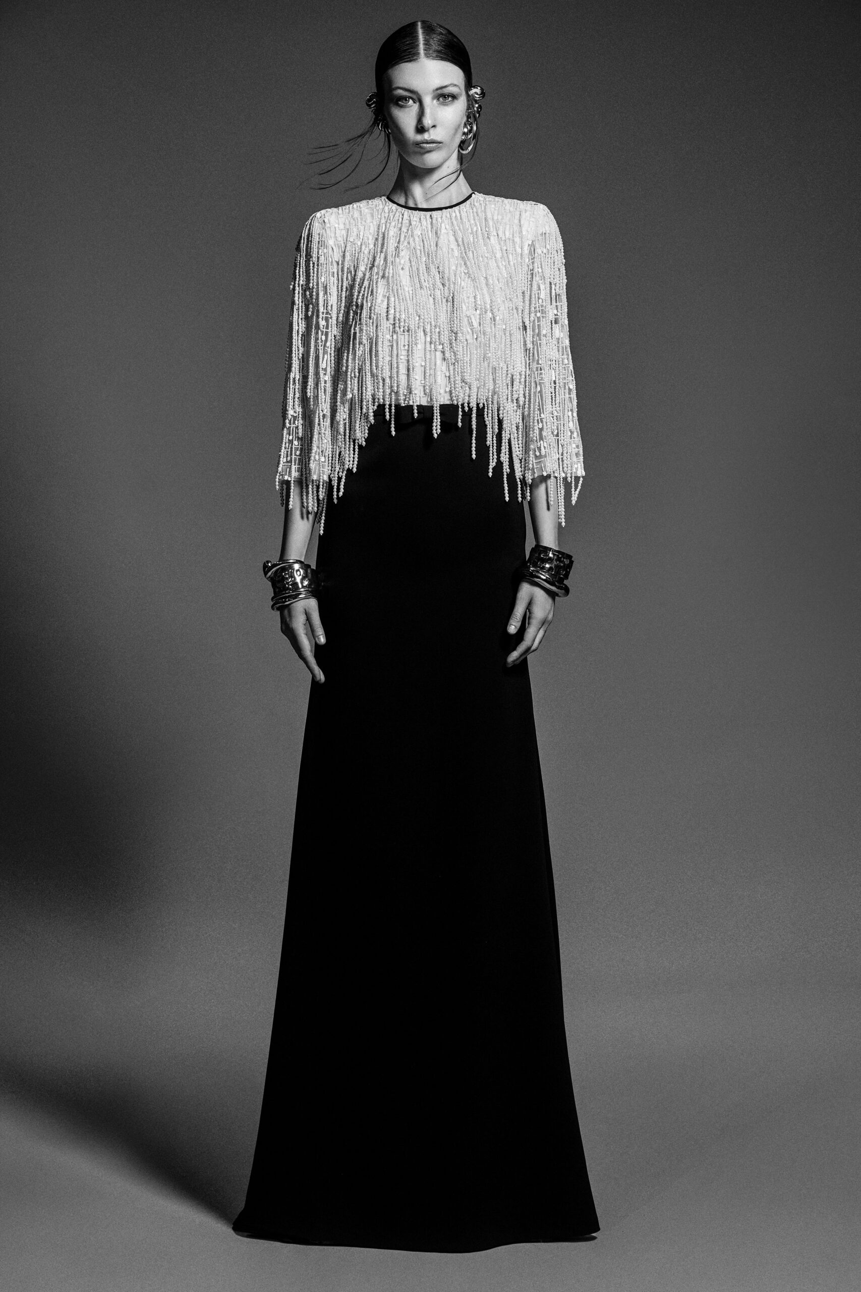 white fringed top black pencil skirt