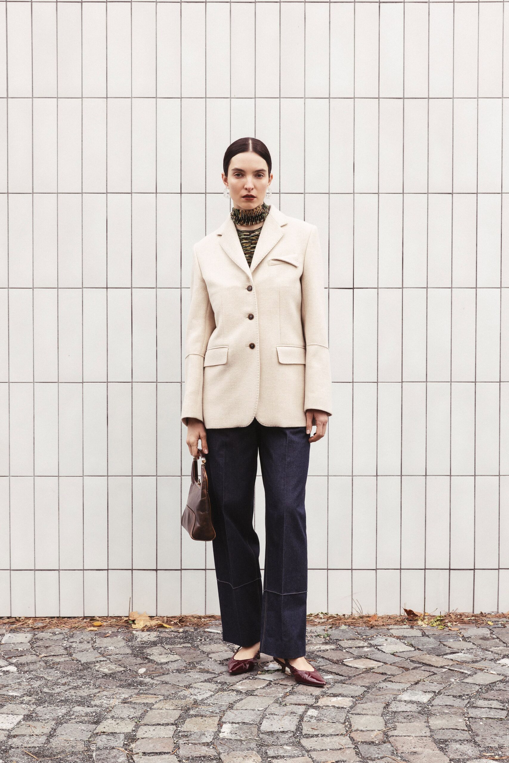 beige tailored blazer with green turtleneck