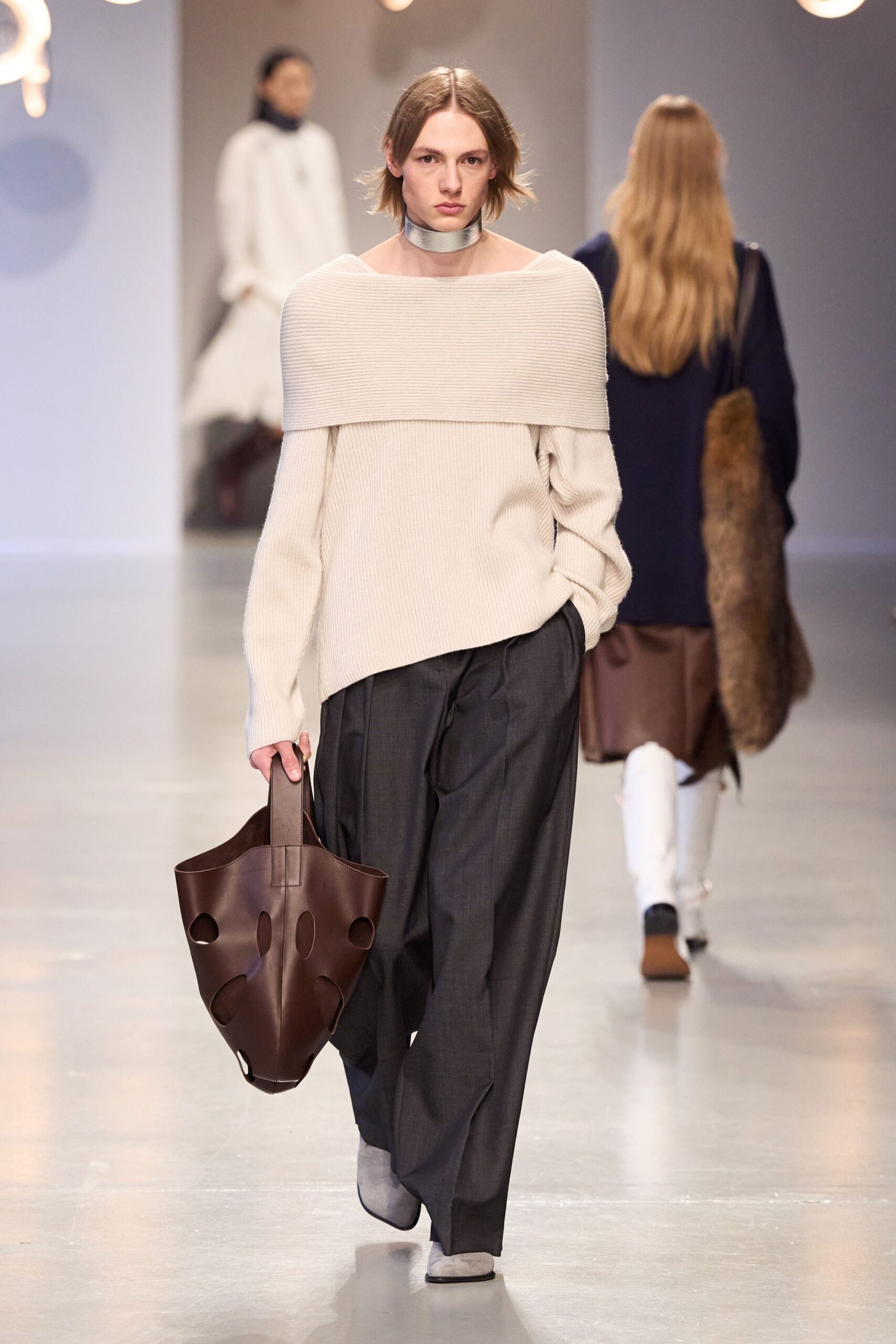 beige off-shoulder sweater with gray pants