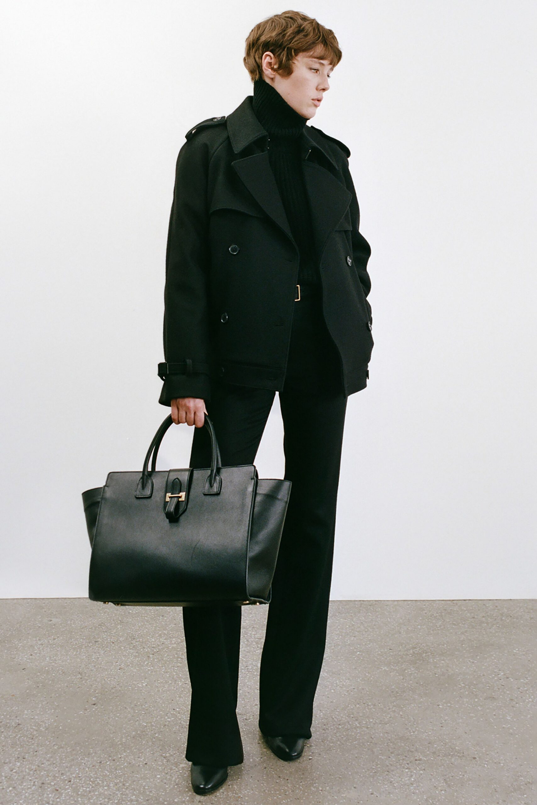 black structured jacket with turtleneck