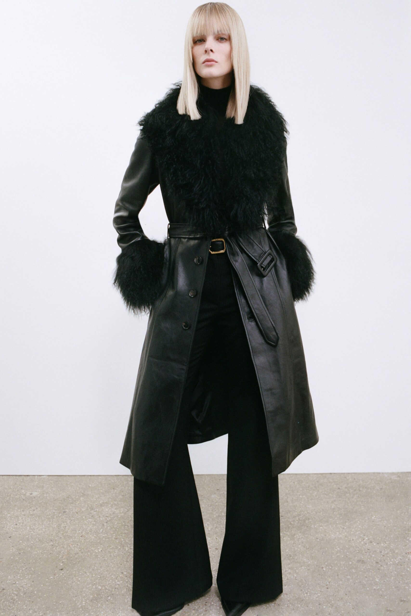 black leather long-sleeve collared fitted belted midi coat