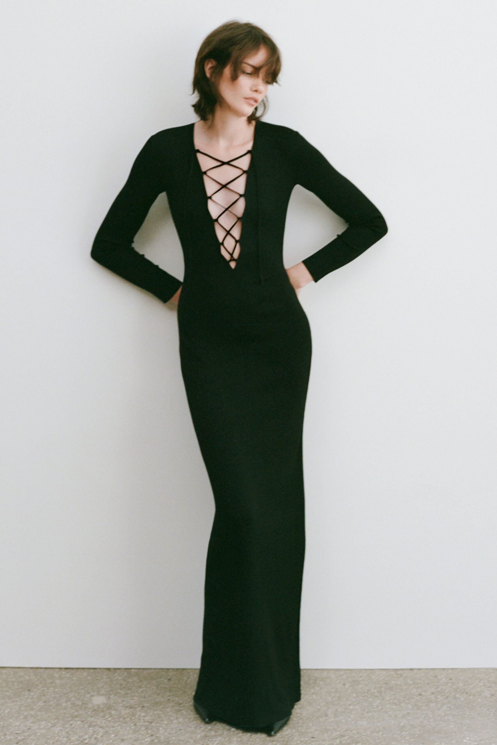 fitted black long-sleeve gown