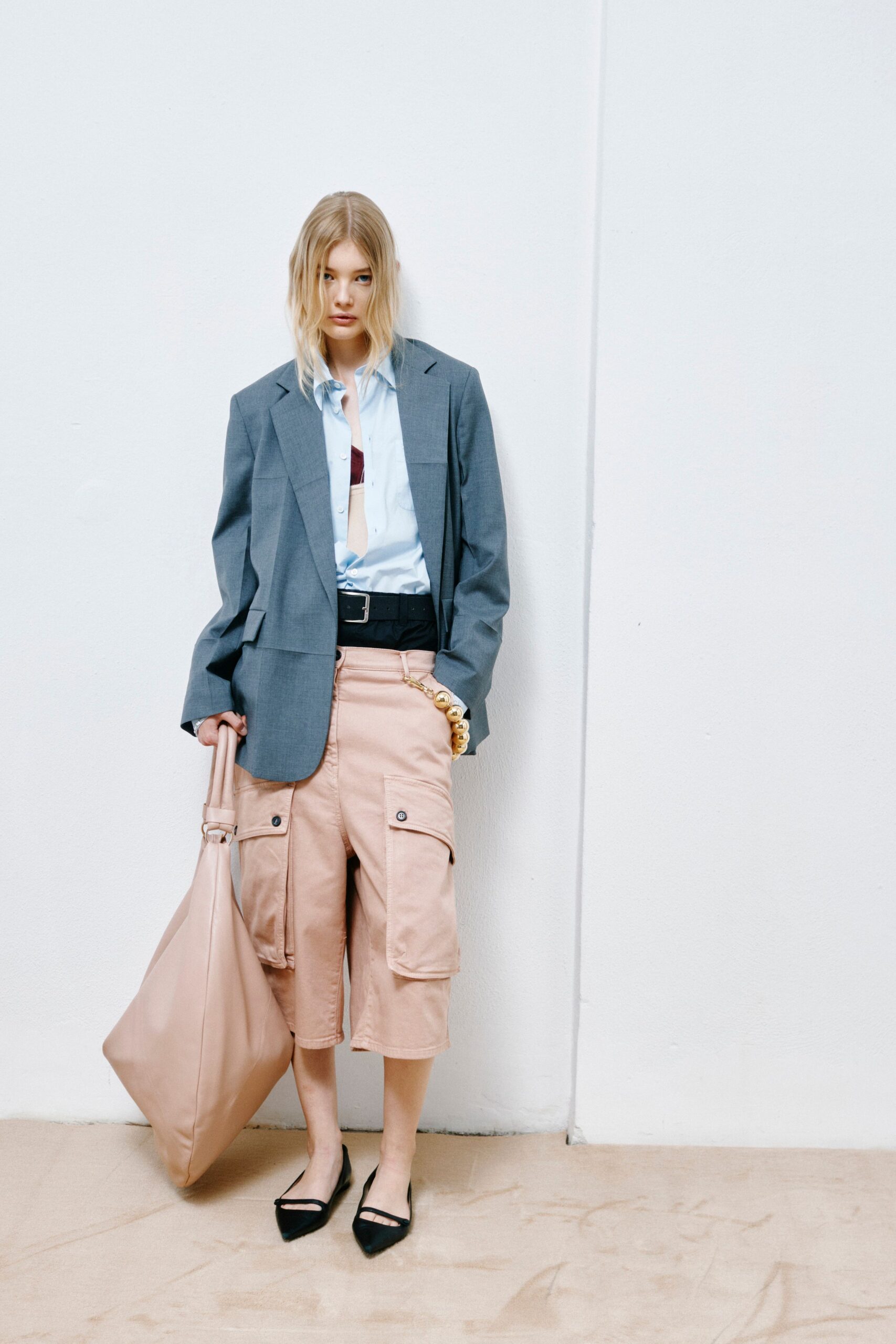gray blazer blue shirt pink skirt
