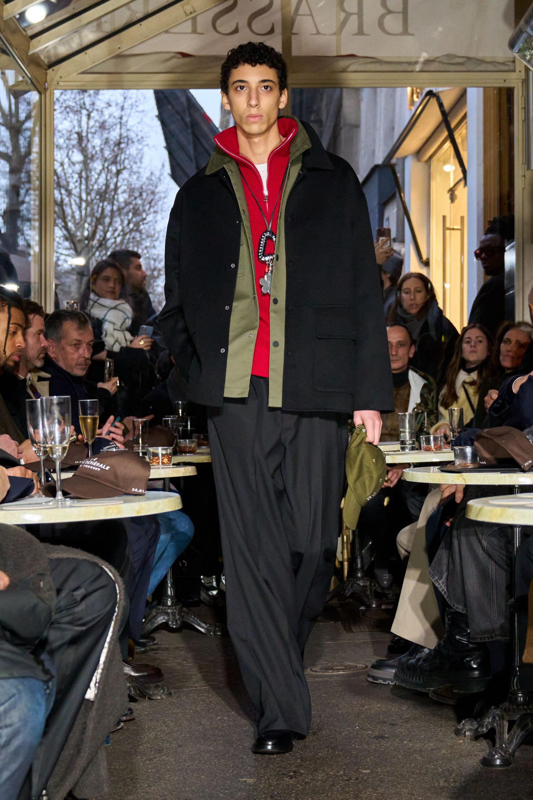 black jacket red shirt relaxed pants