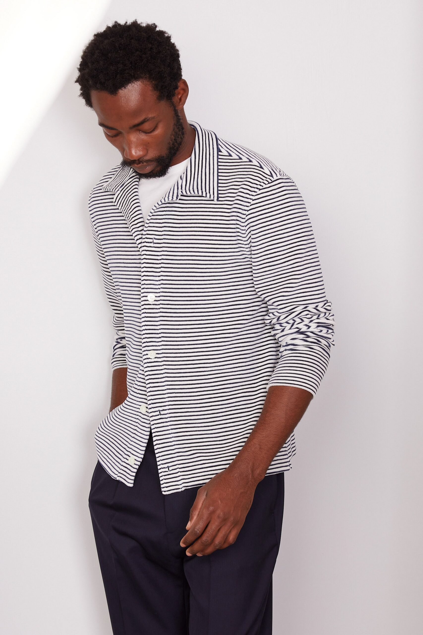 striped shirt and black pants