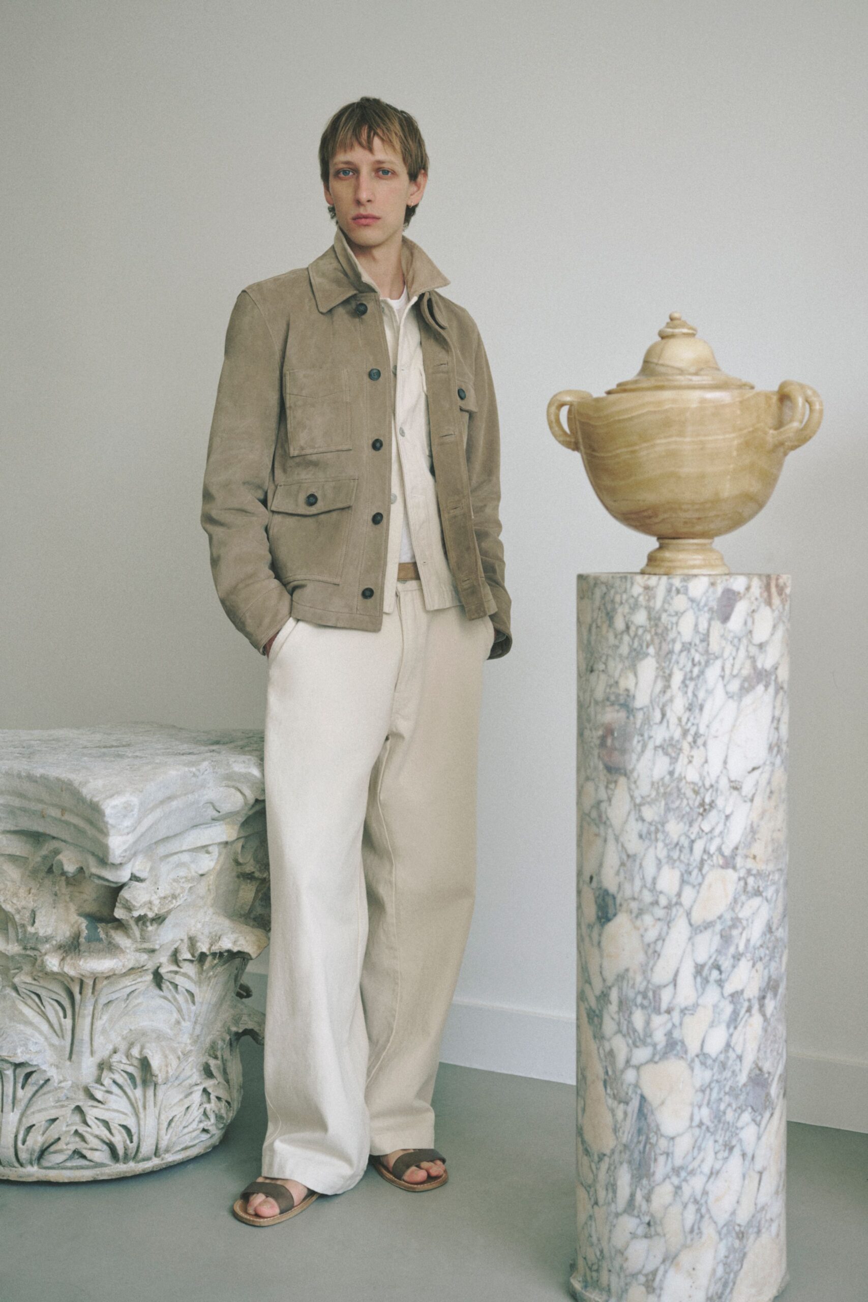 beige suede jacket with white shirt