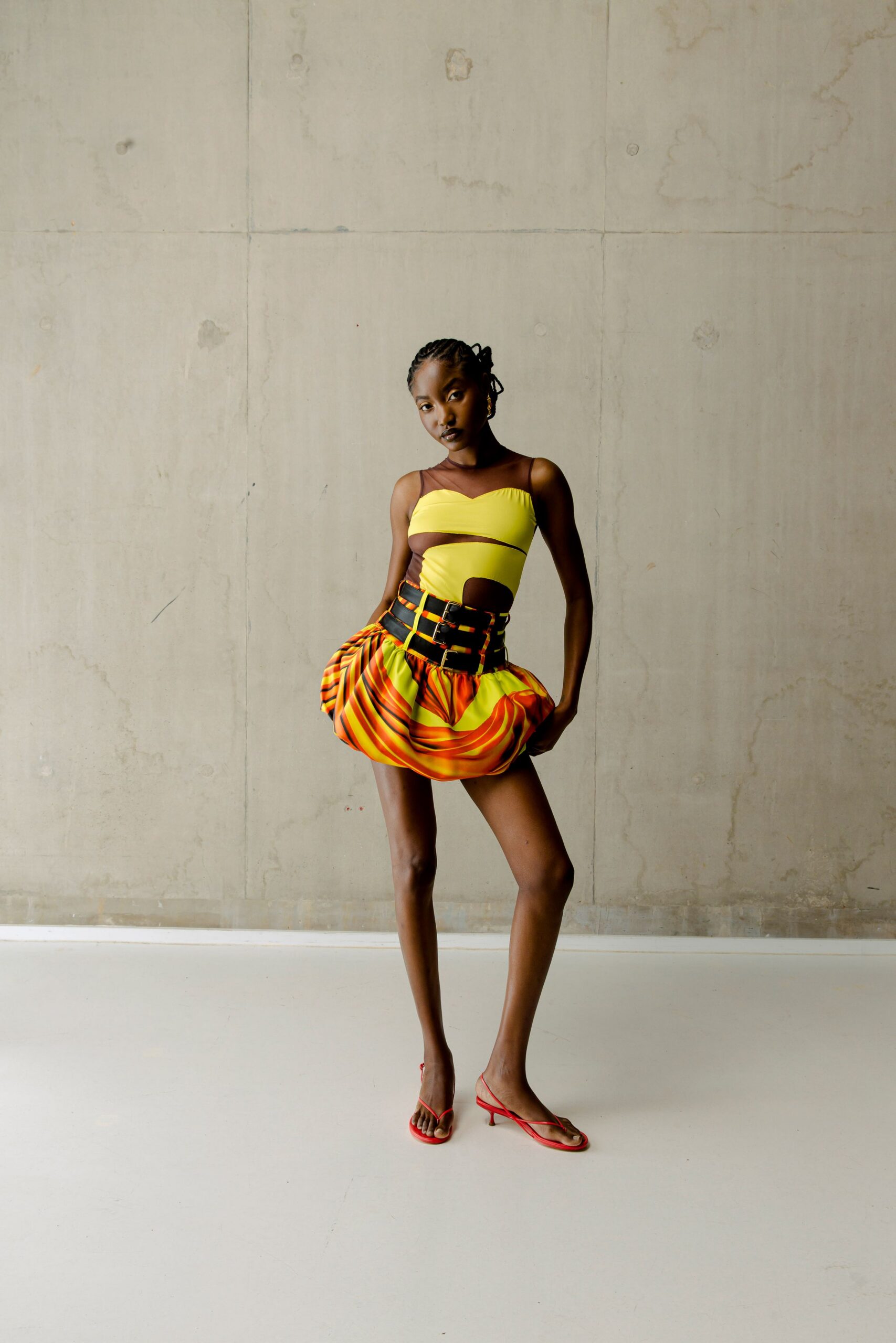 yellow and orange mini dress with red shoes