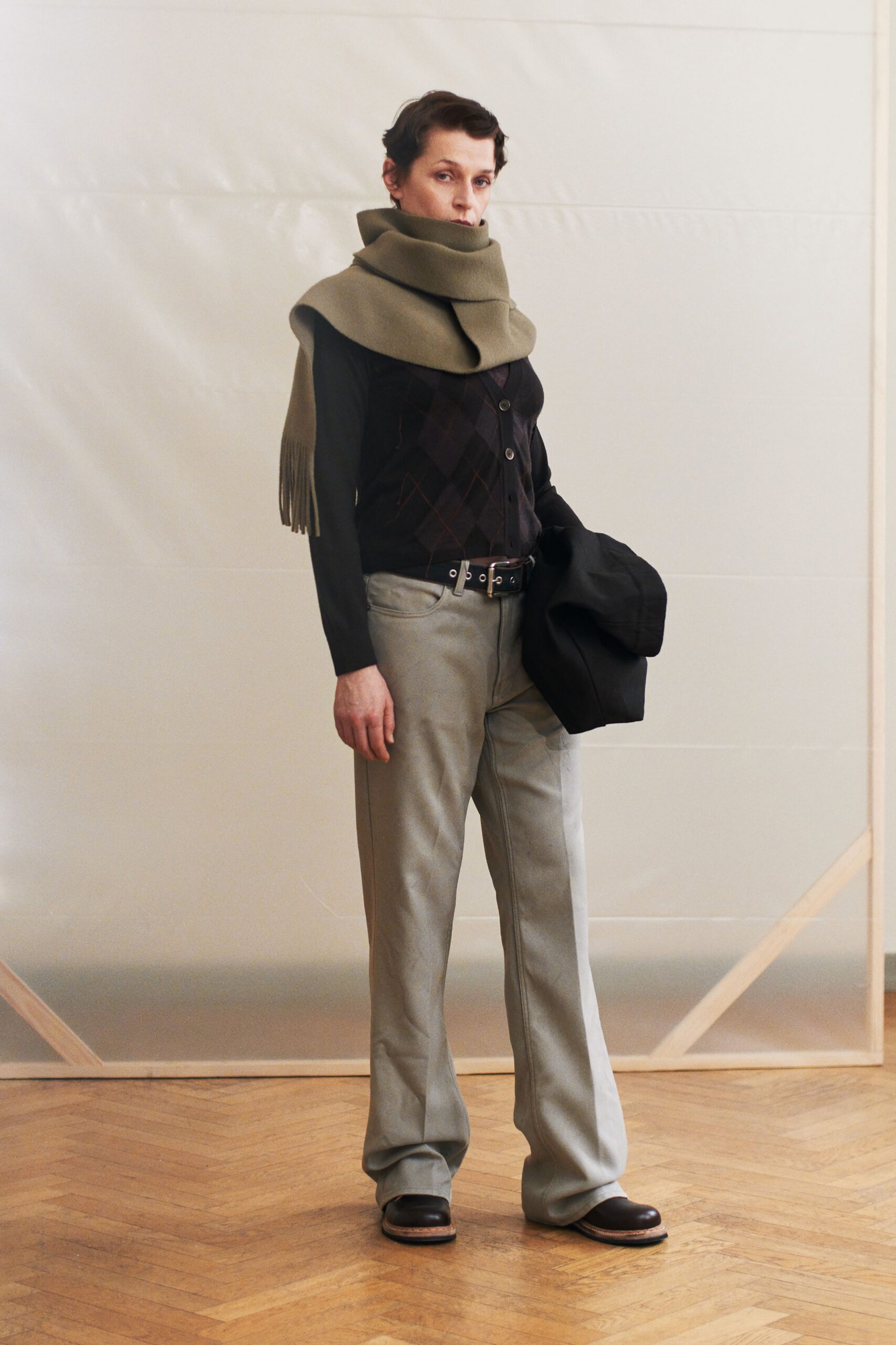 black wool vest with gray pants