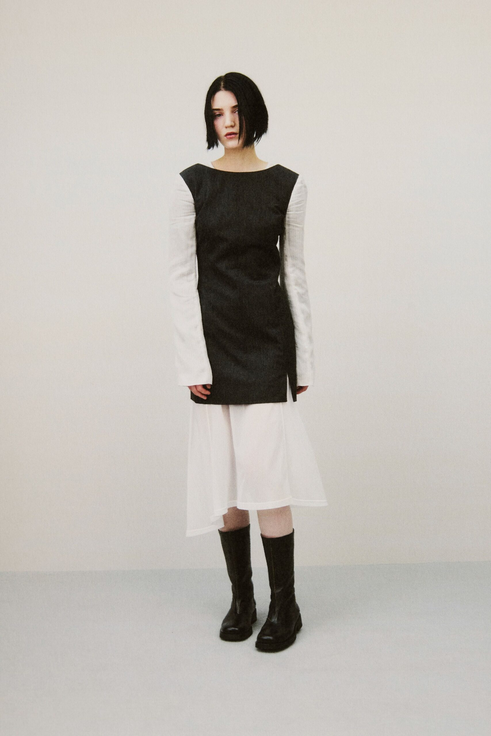 black and white layered midi dress with boots