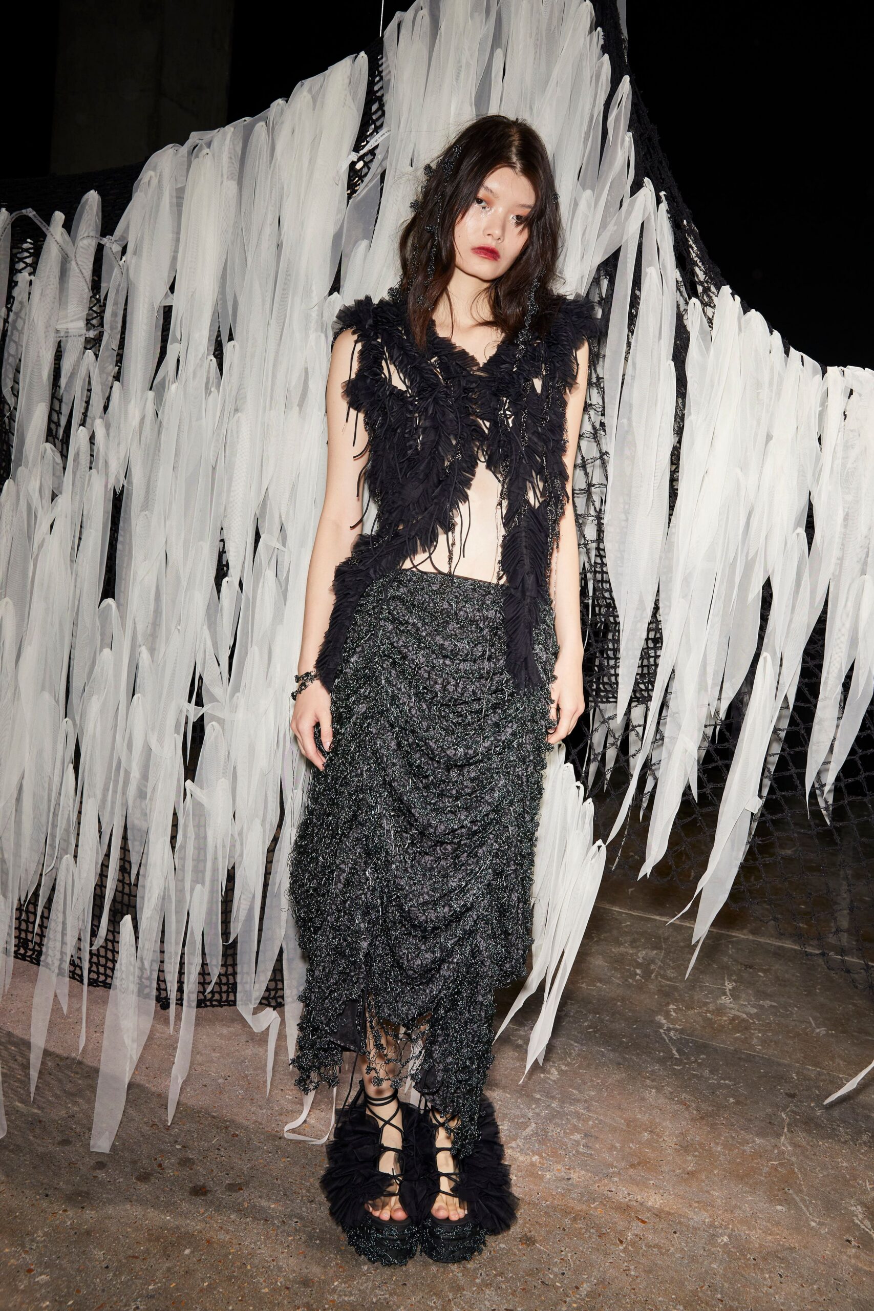 black fur sleeveless v-neck fitted fringed top