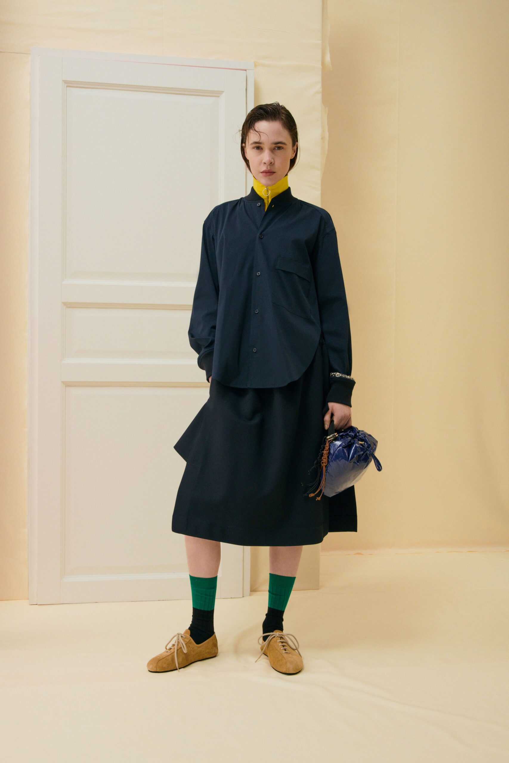 navy shirt and skirt outfit