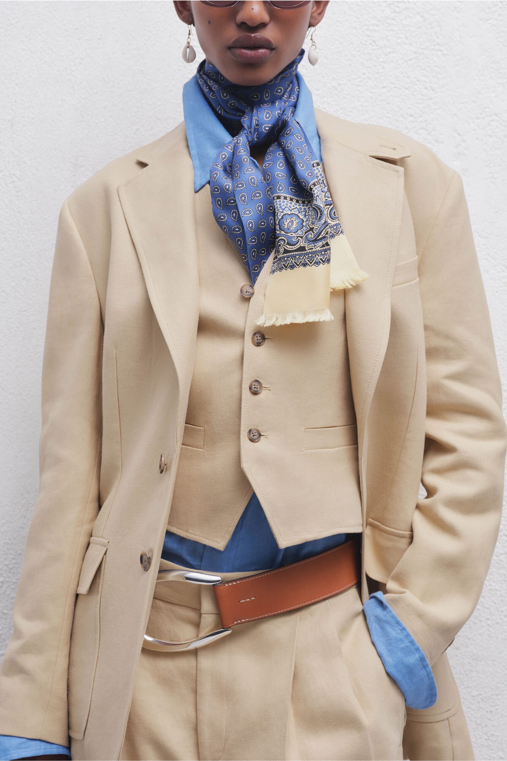 beige cotton sleeveless fitted buttoned vest