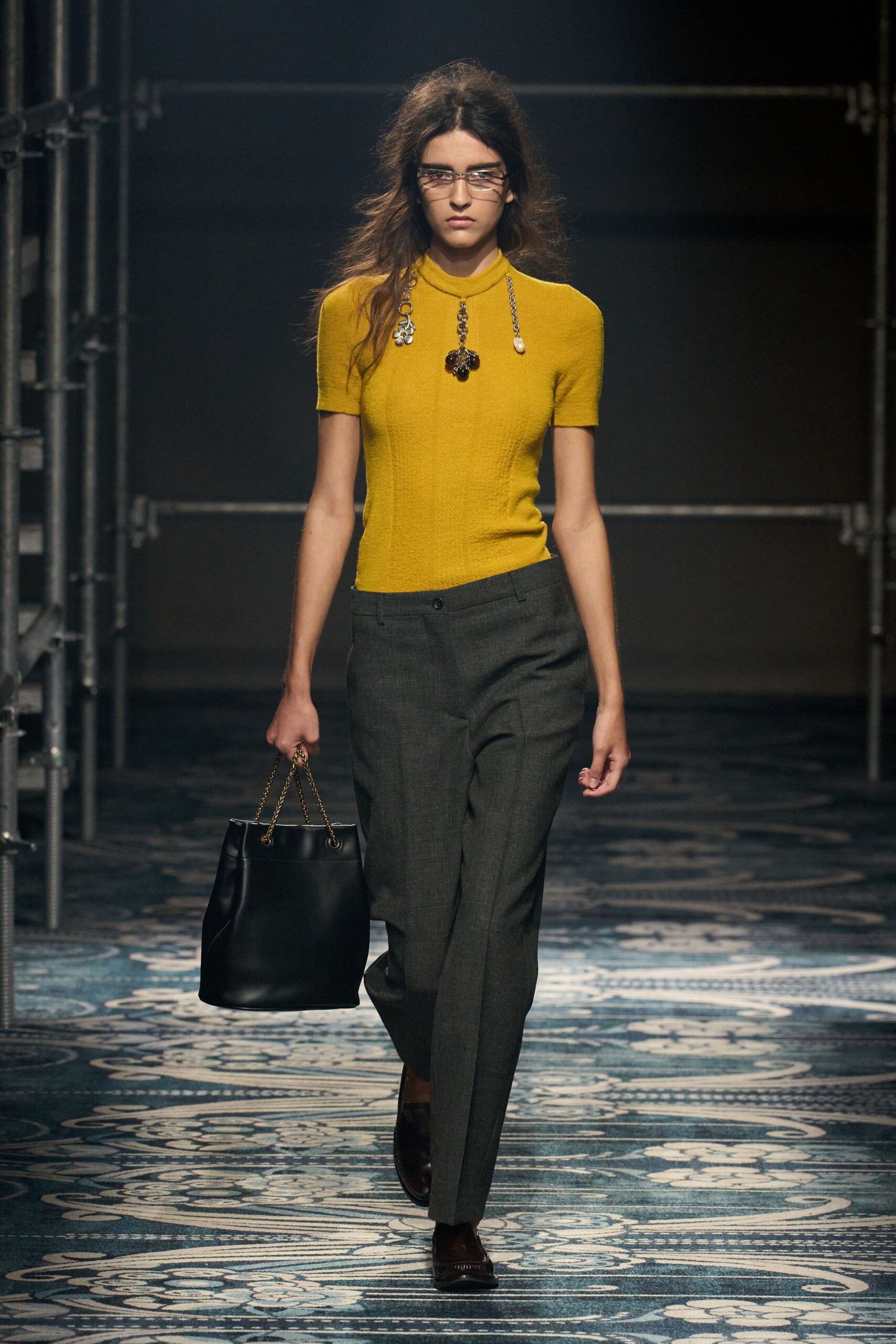 yellow fitted top gray tailored pants