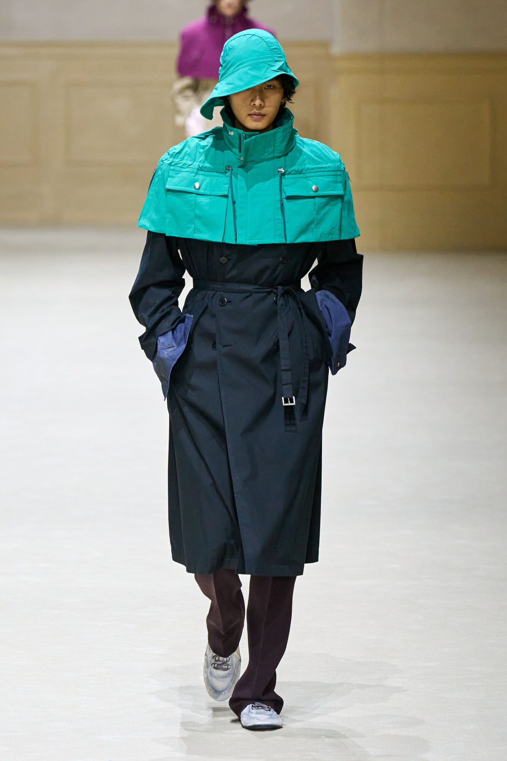 black and blue trench coat with hat