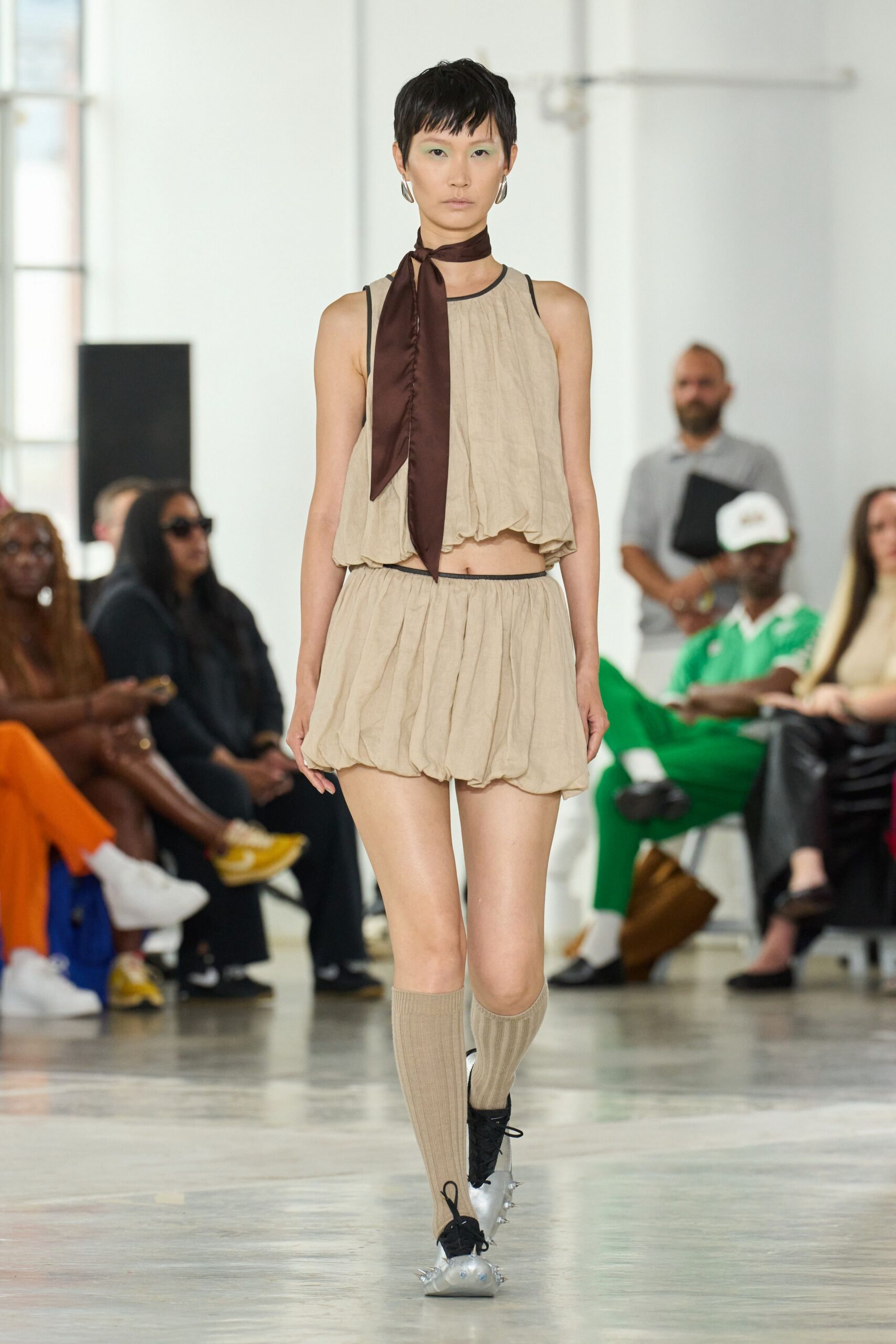beige cotton sleeveless high-neck relaxed pleated cropped top