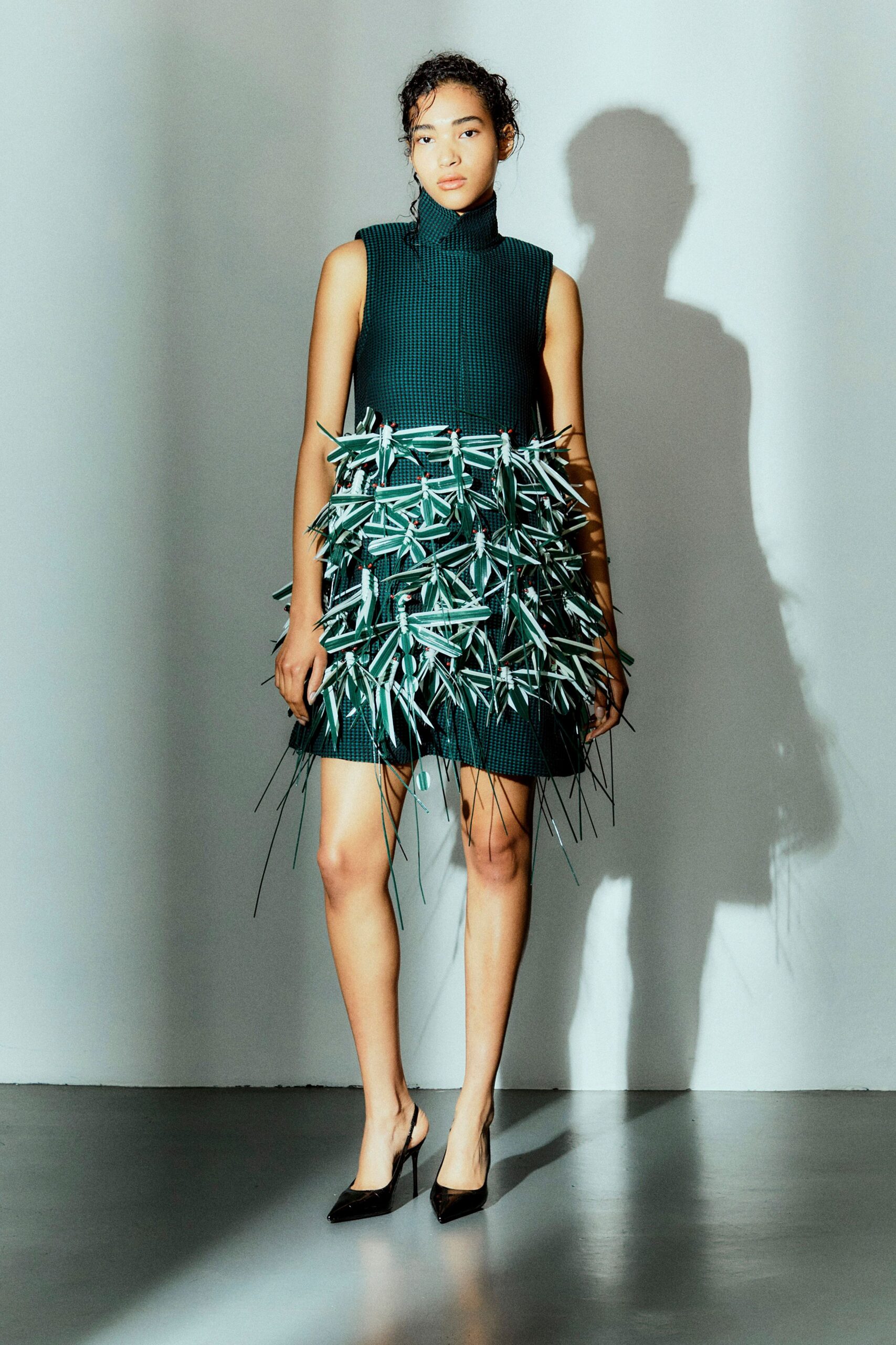 green cotton sleeveless high-neck fitted pleated embellished dress