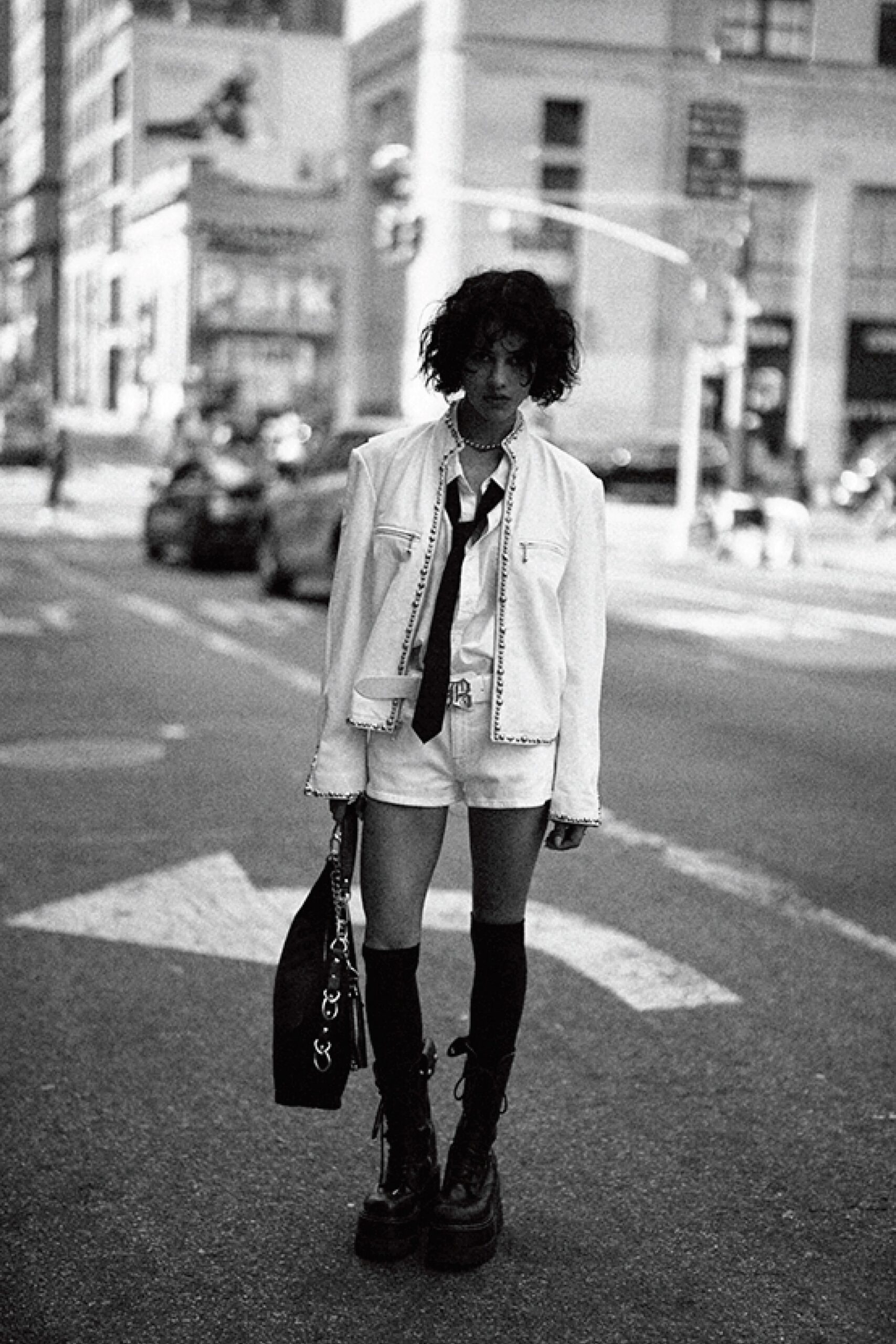 white denim jacket black shirt shorts