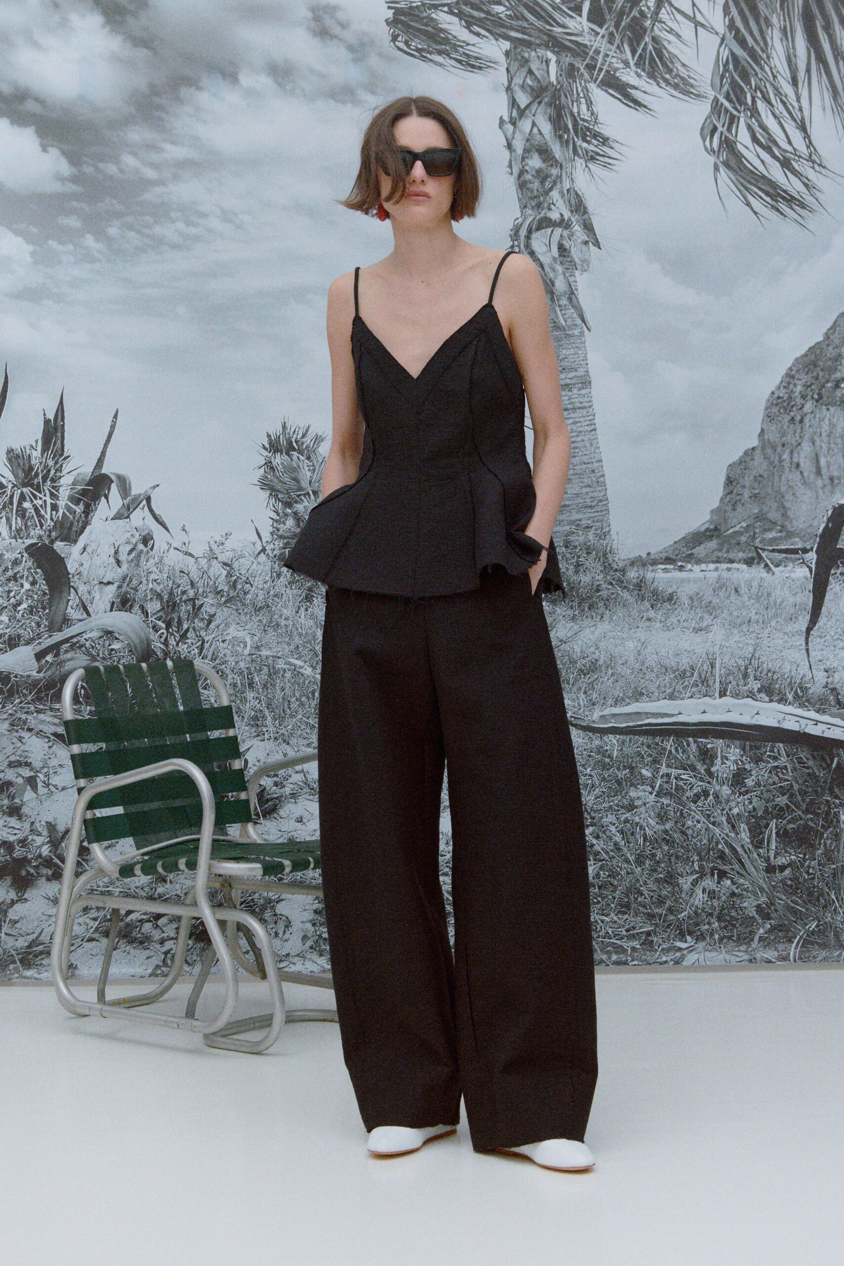 black cotton sleeveless v-neck fitted flared top