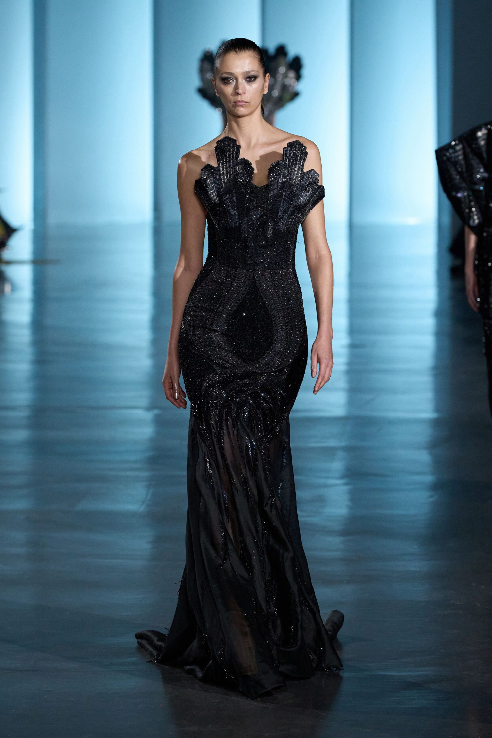 black beaded off-shoulder gown