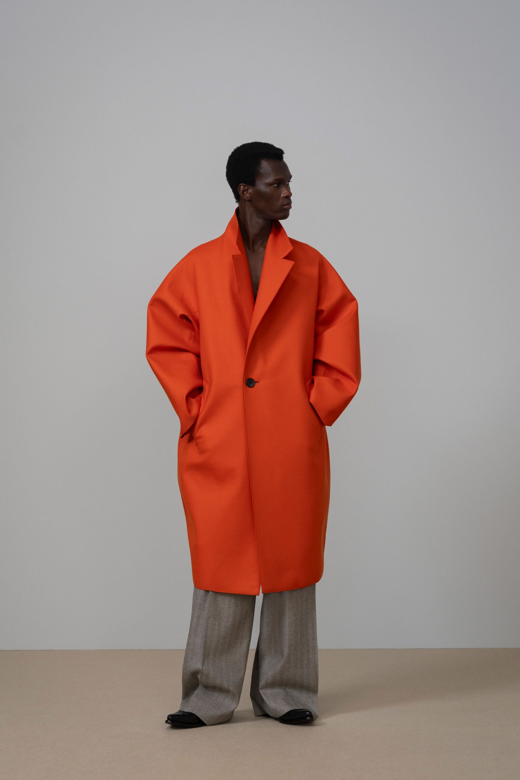 orange long-sleeve collared oversized coat