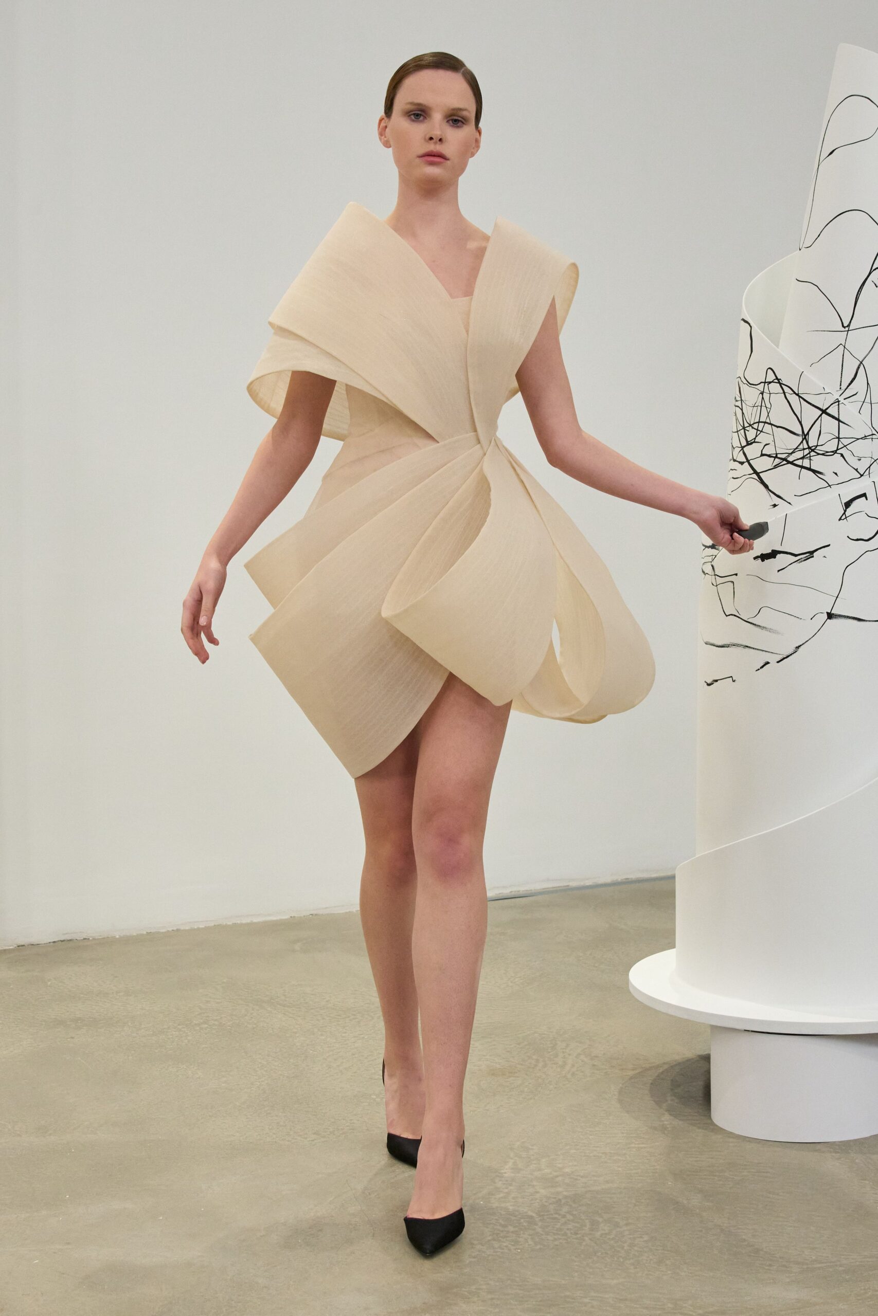 beige silk sleeveless v-neck fitted draped flowing dress
