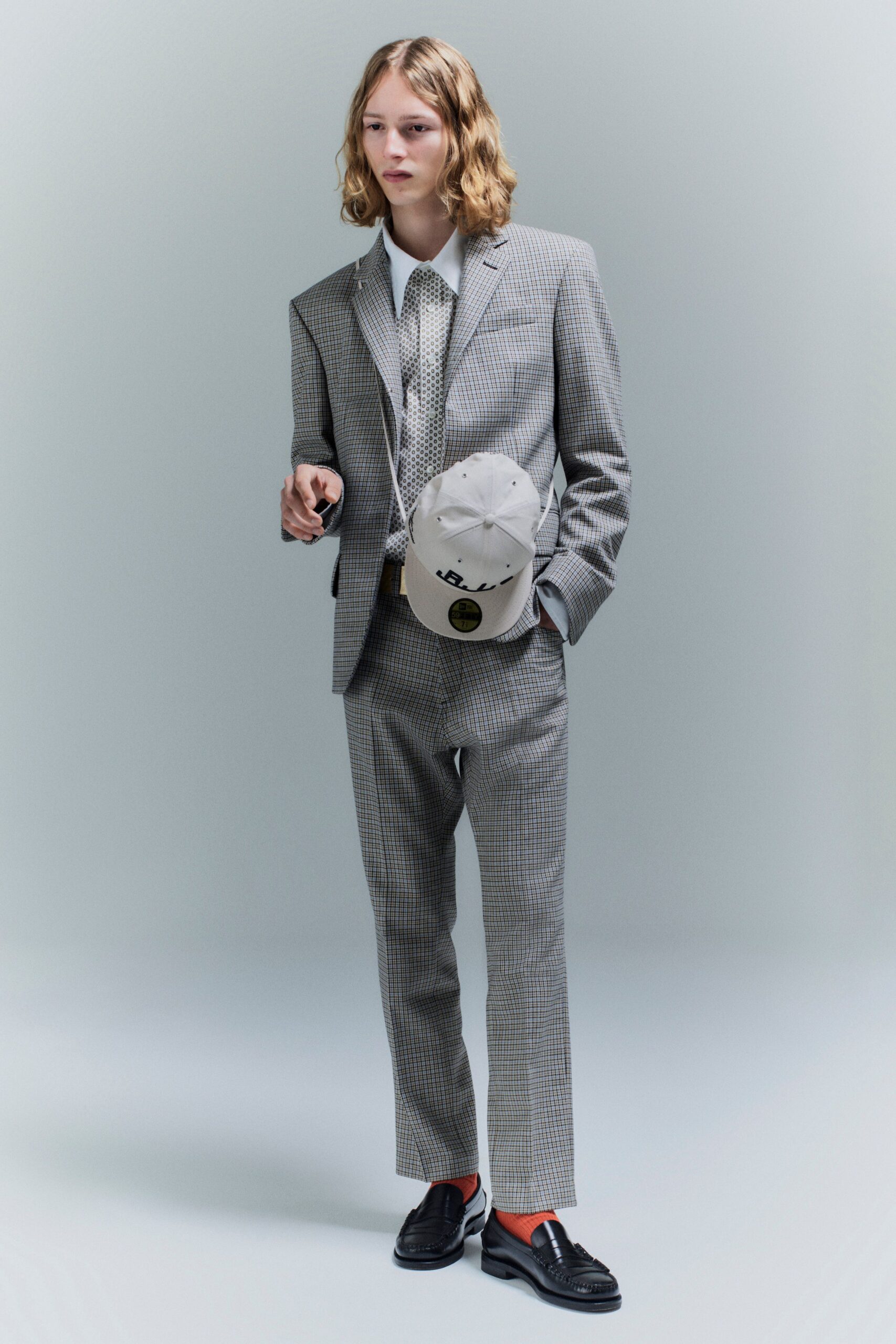 gray tailored suit with hat