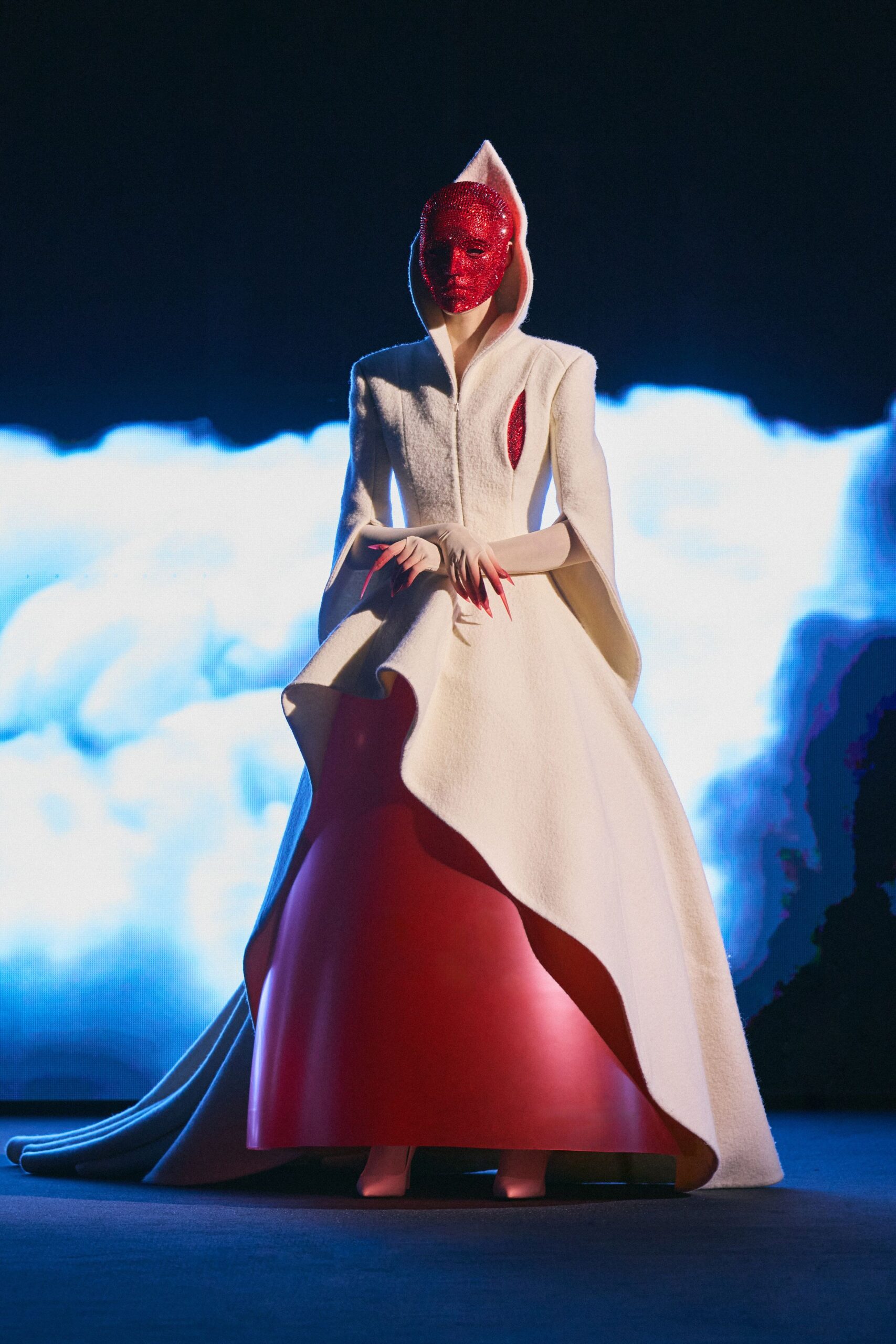 white hooded asymmetric gown