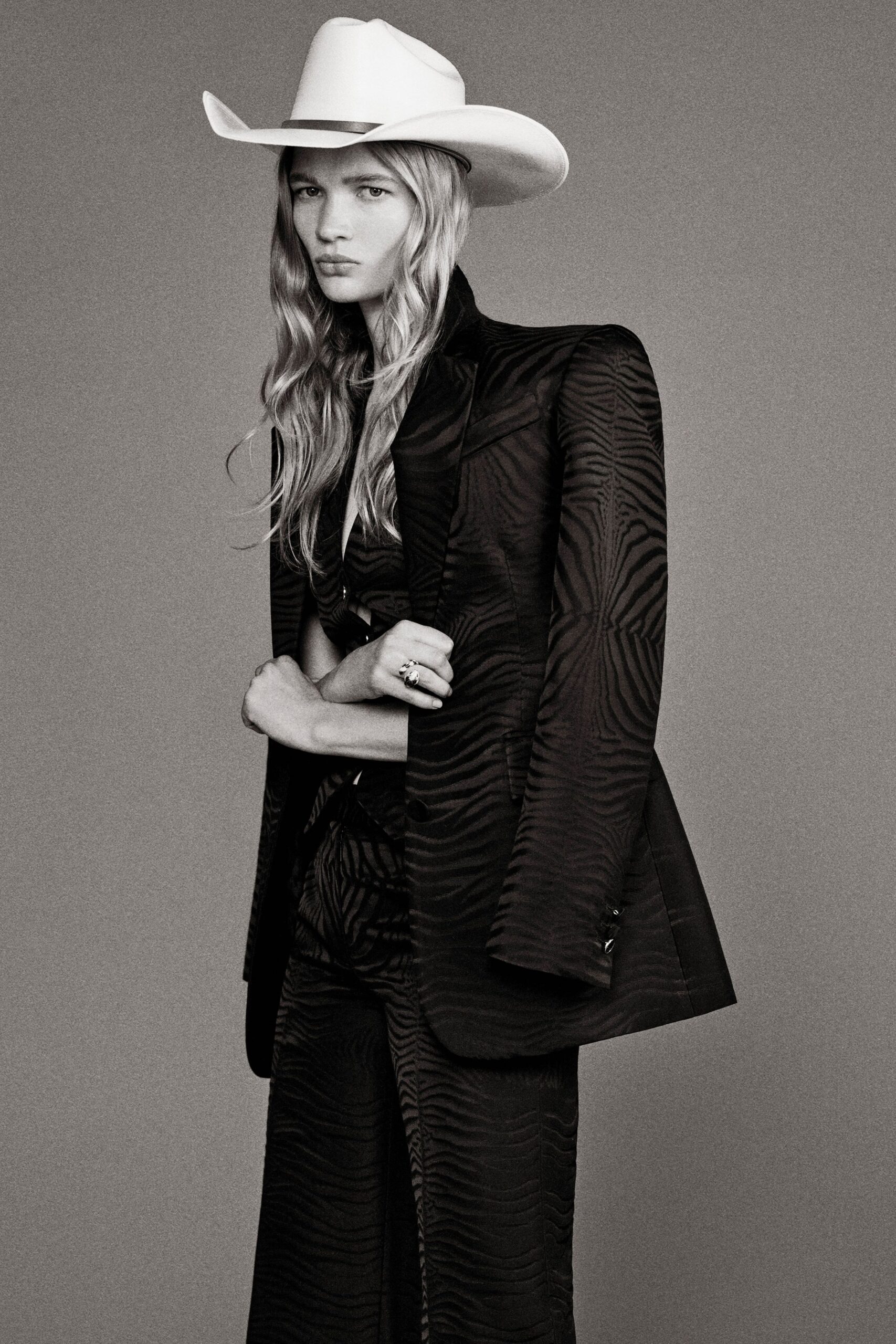 black silk tailored blazer and pants with white hat