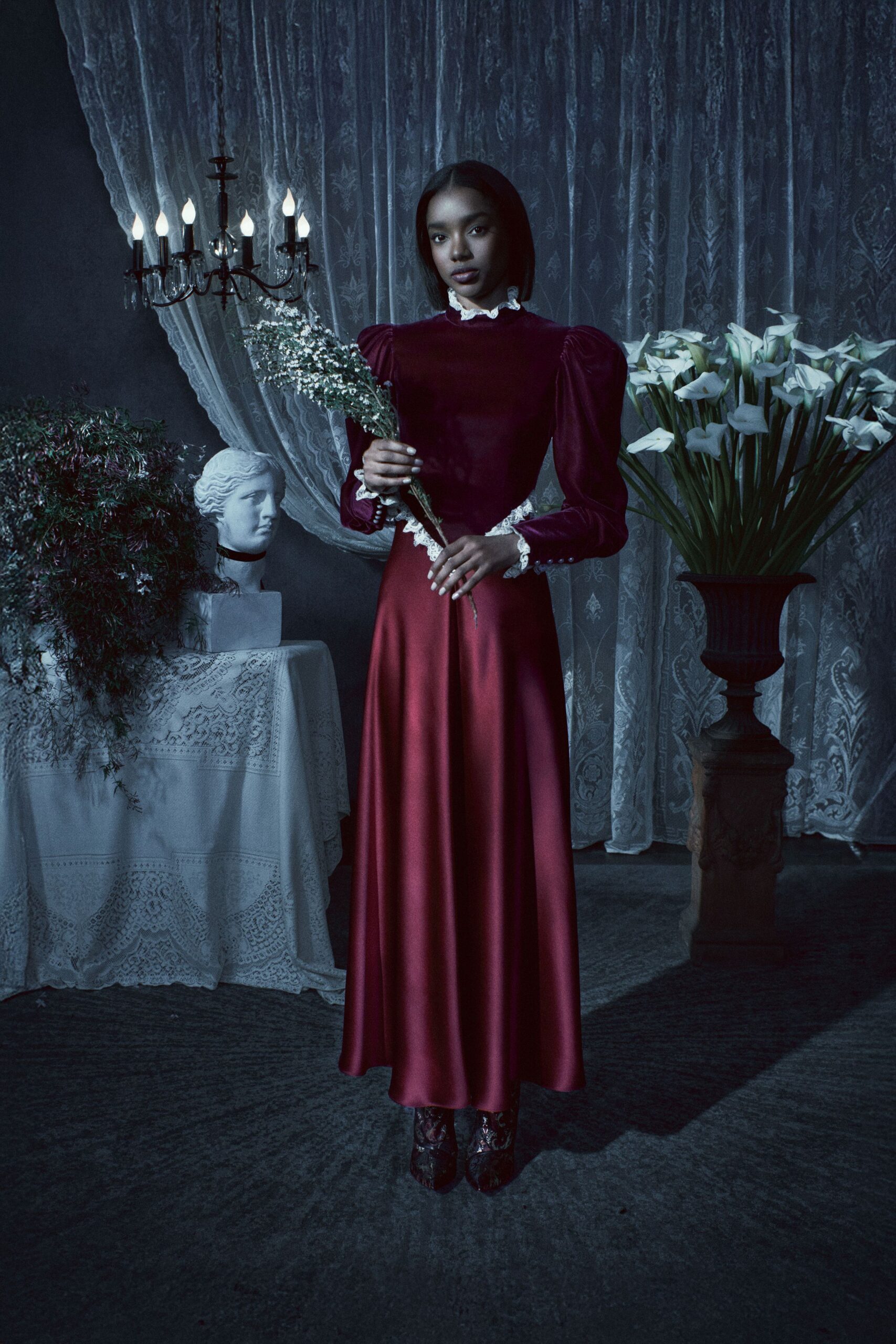 red silk long-sleeve high-neck fitted pleated padded gown