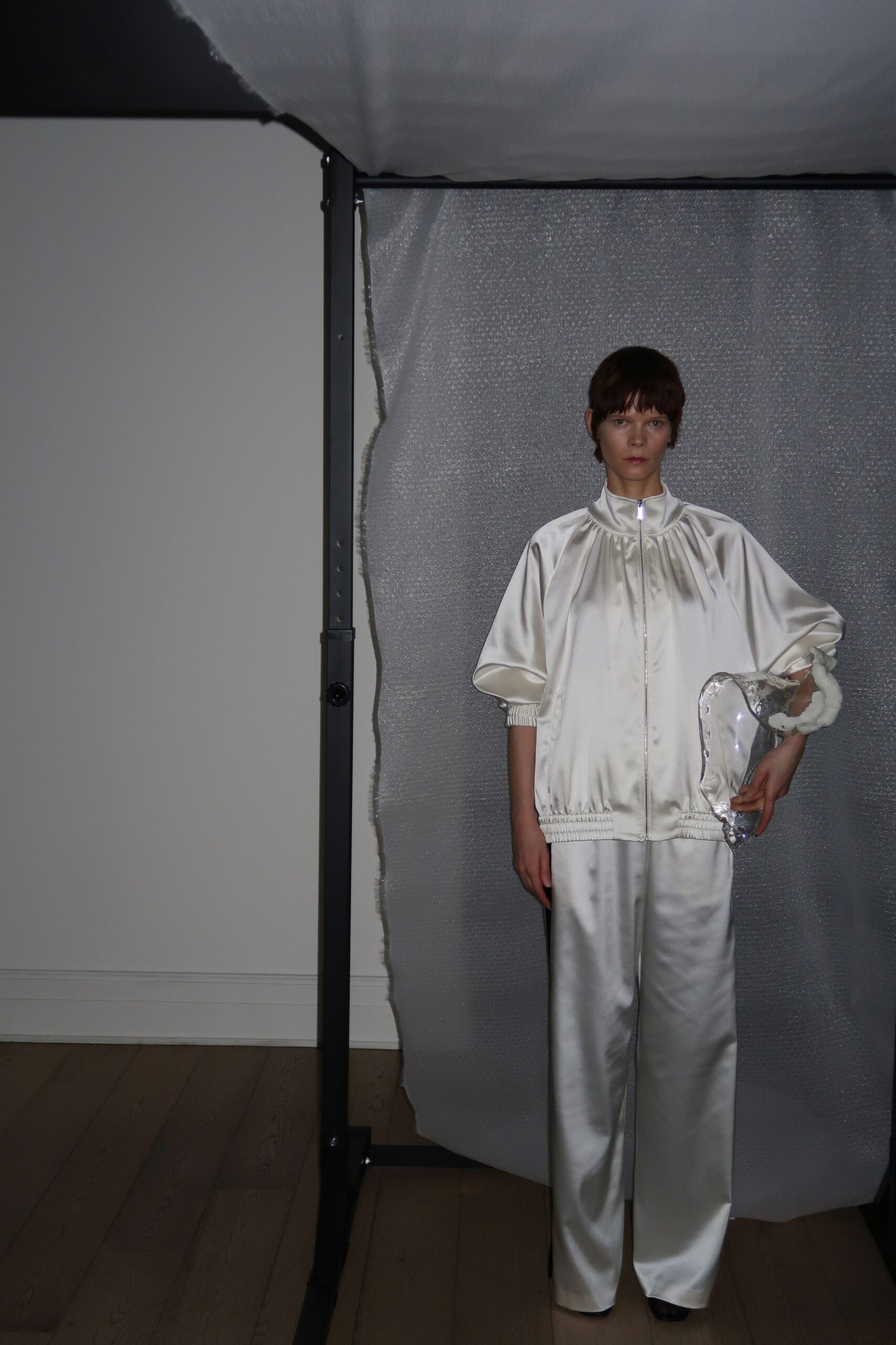 white satin long-sleeve collared relaxed shiny jacket