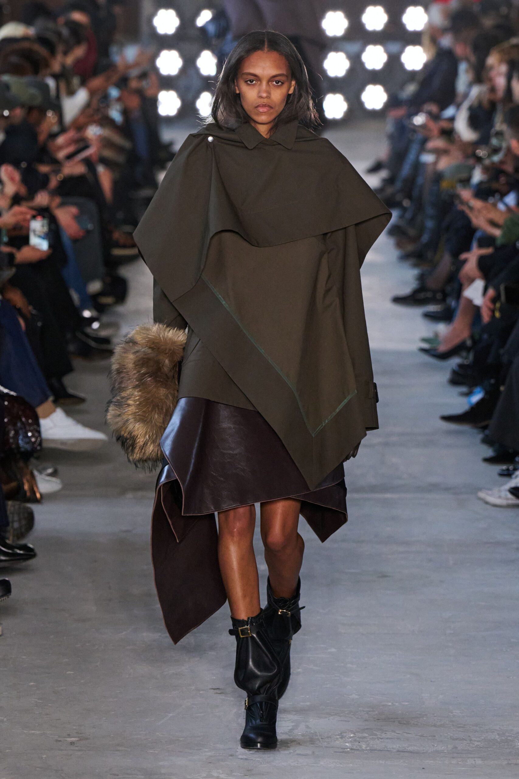 green wool cape brown leather skirt