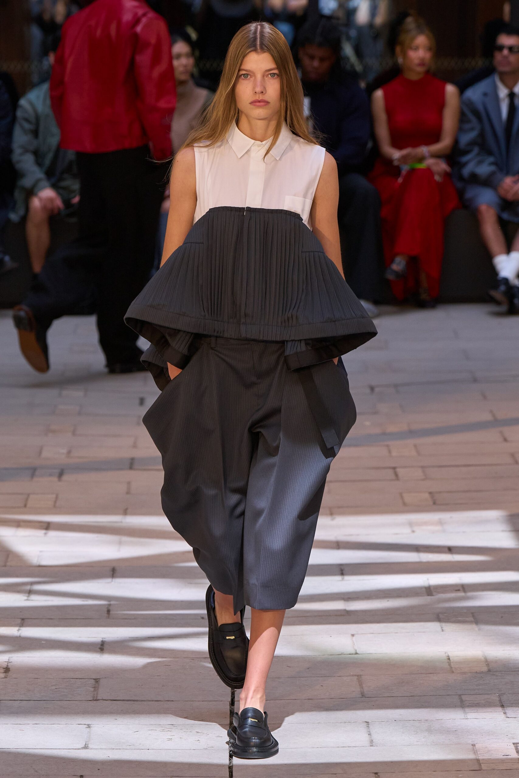 black and white pleated top with relaxed pants