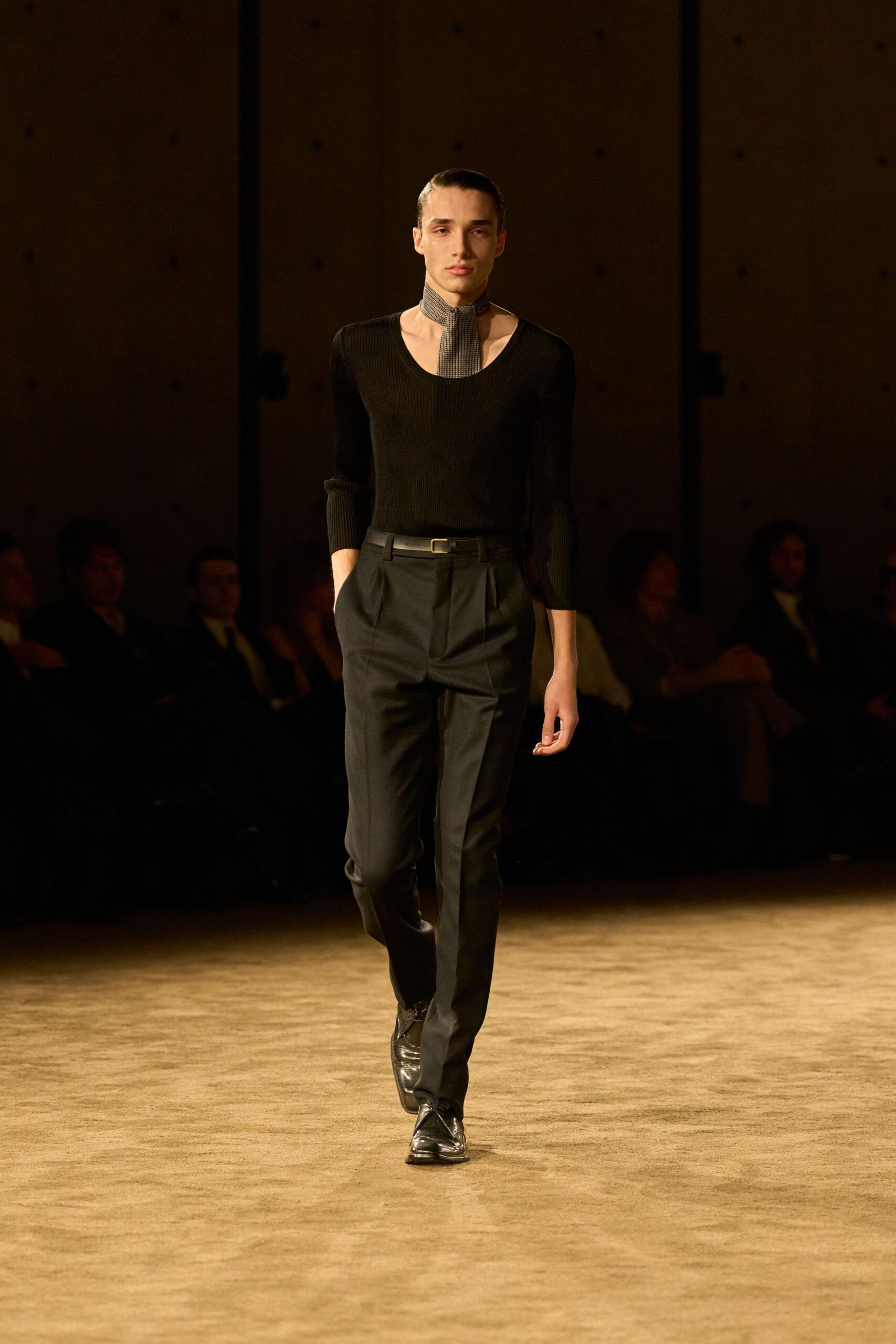 black fitted top and tailored pants