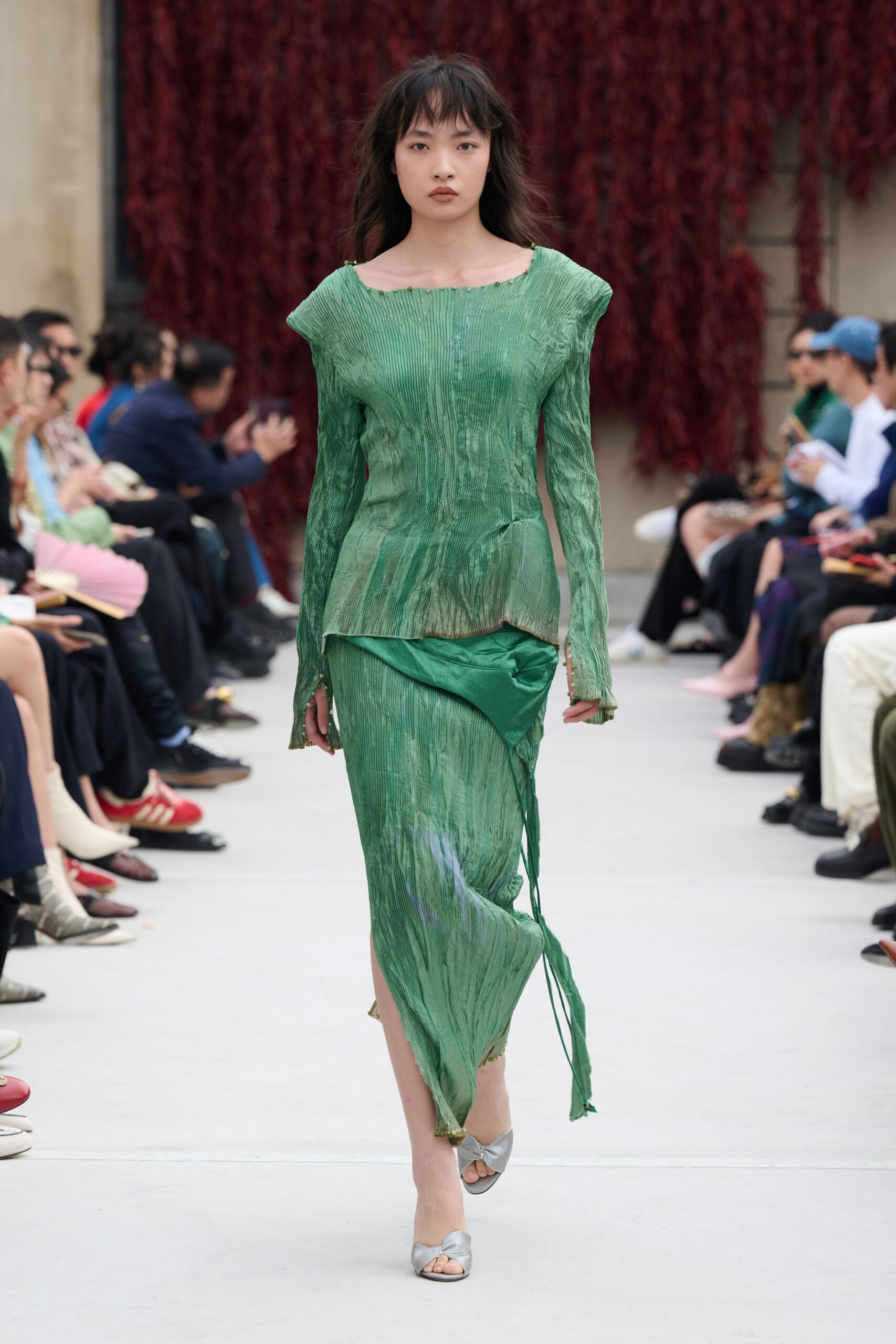 green silk long-sleeve v-neck fitted pleated flowing top