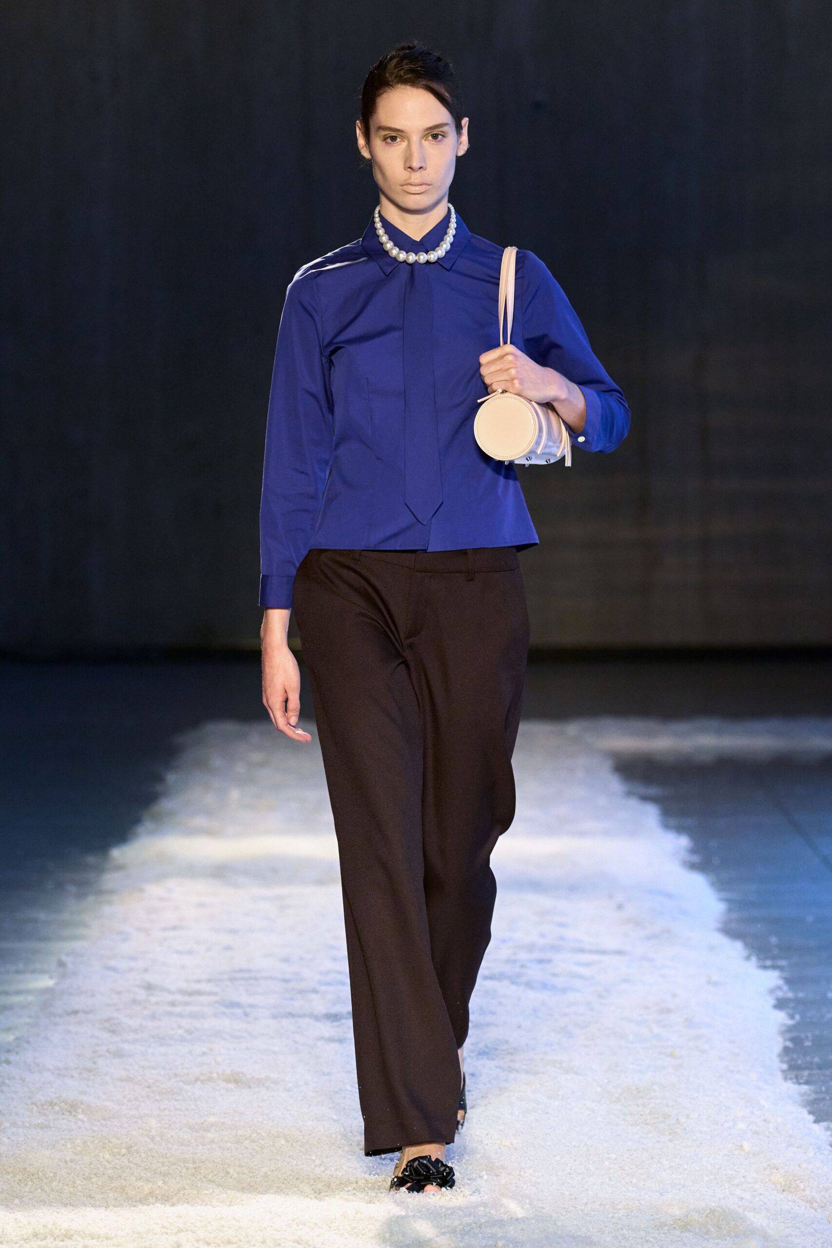 blue fitted shirt with black pants