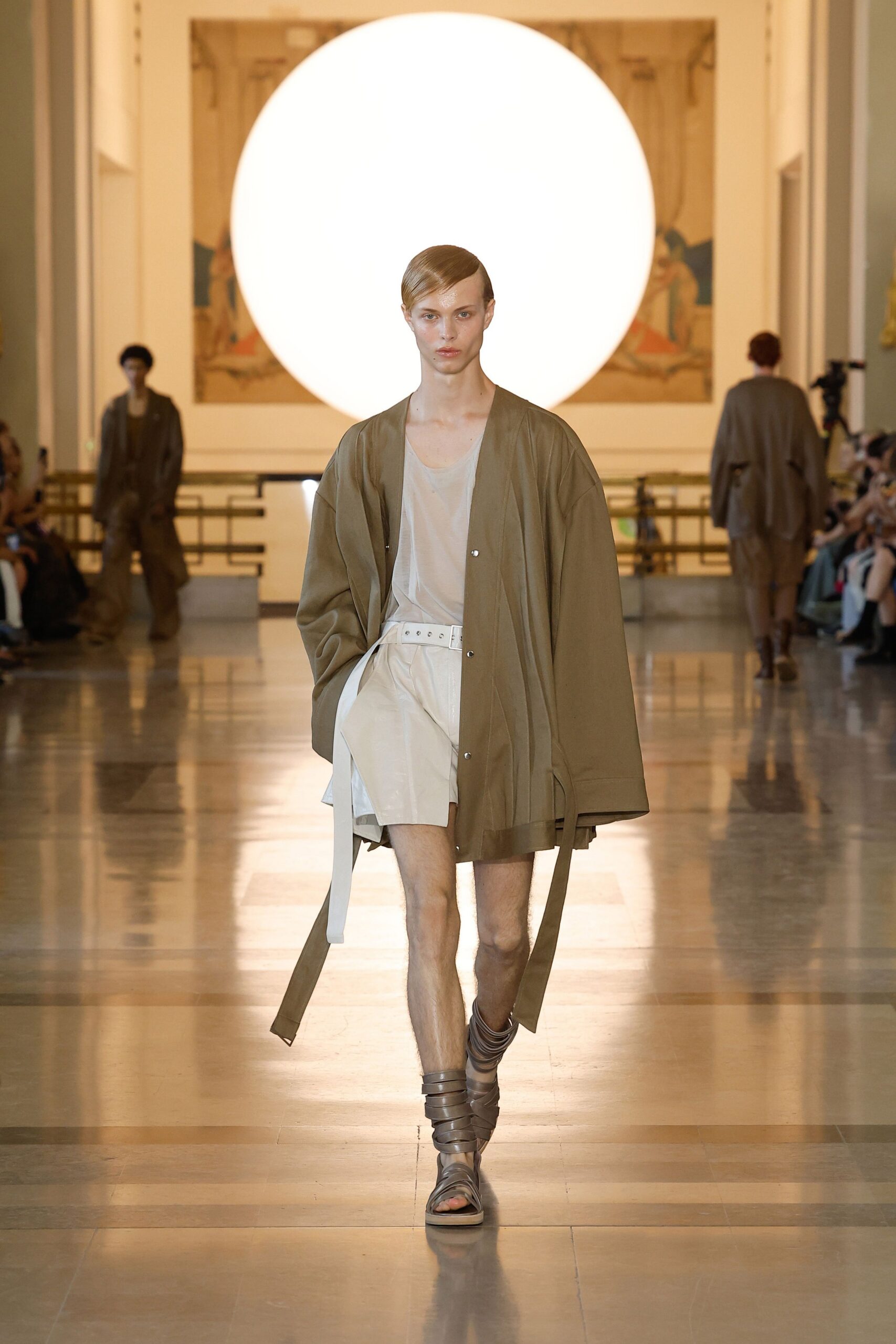 brown relaxed jacket with beige shorts