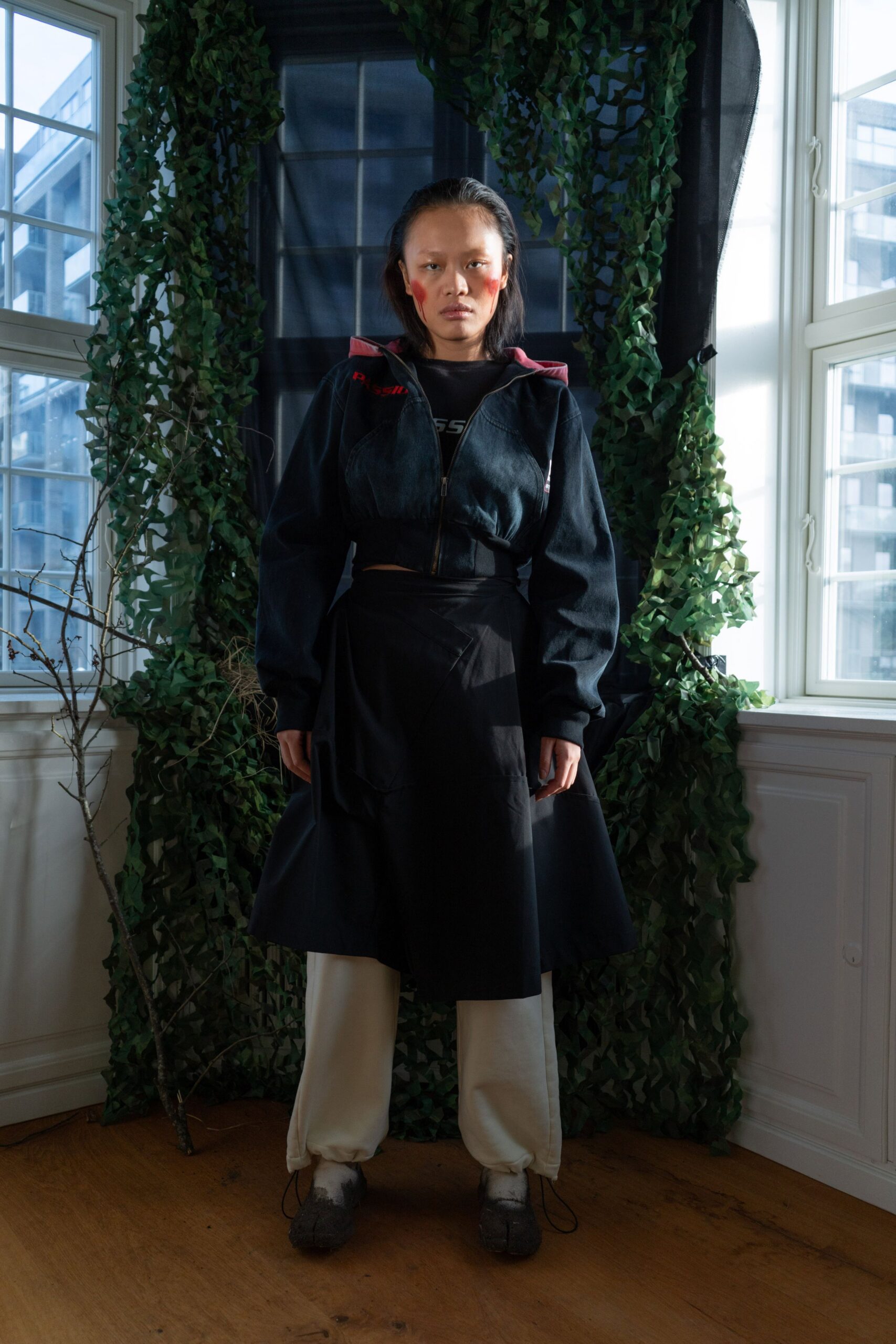 black denim jacket with asymmetric skirt