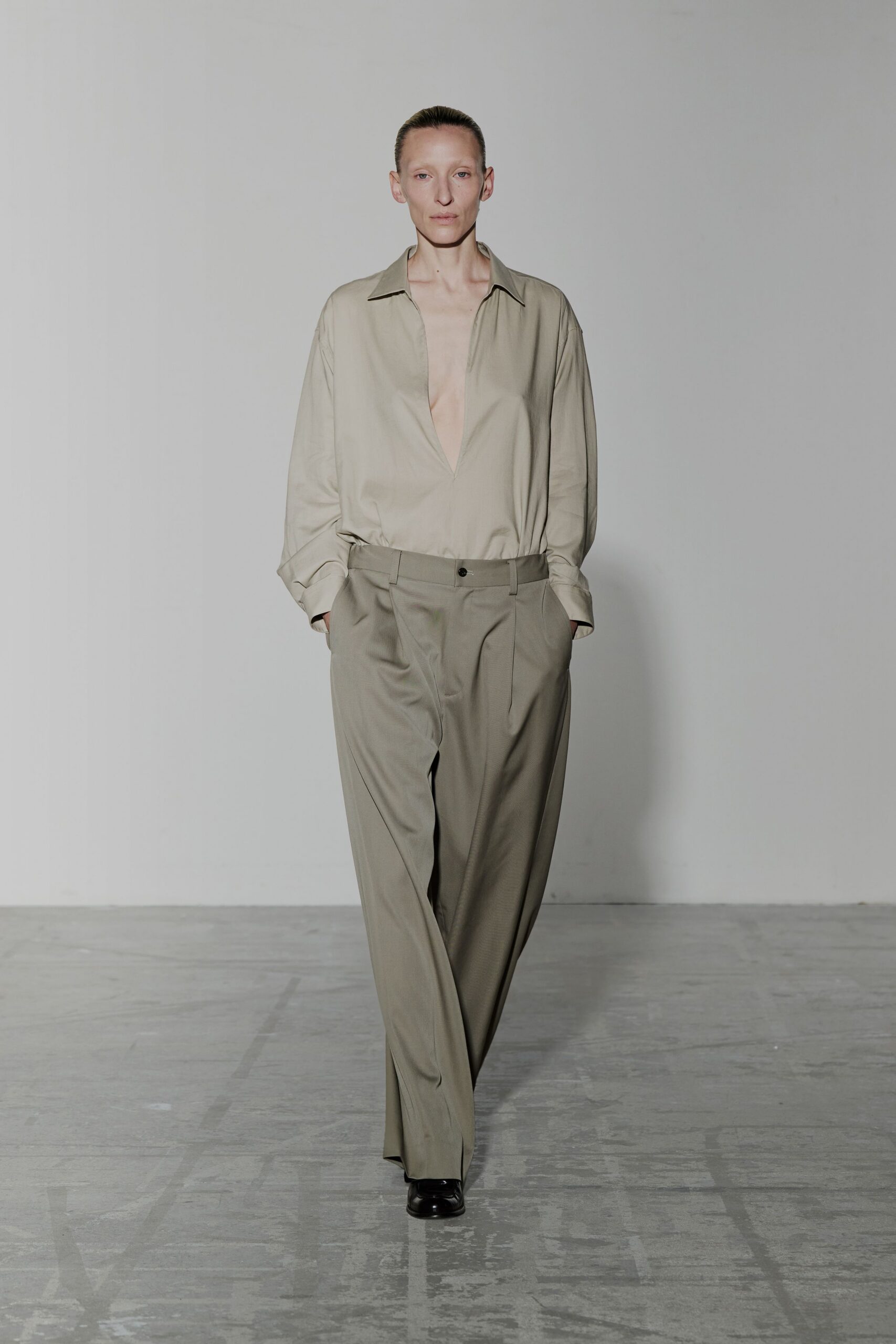 beige relaxed shirt gray pants