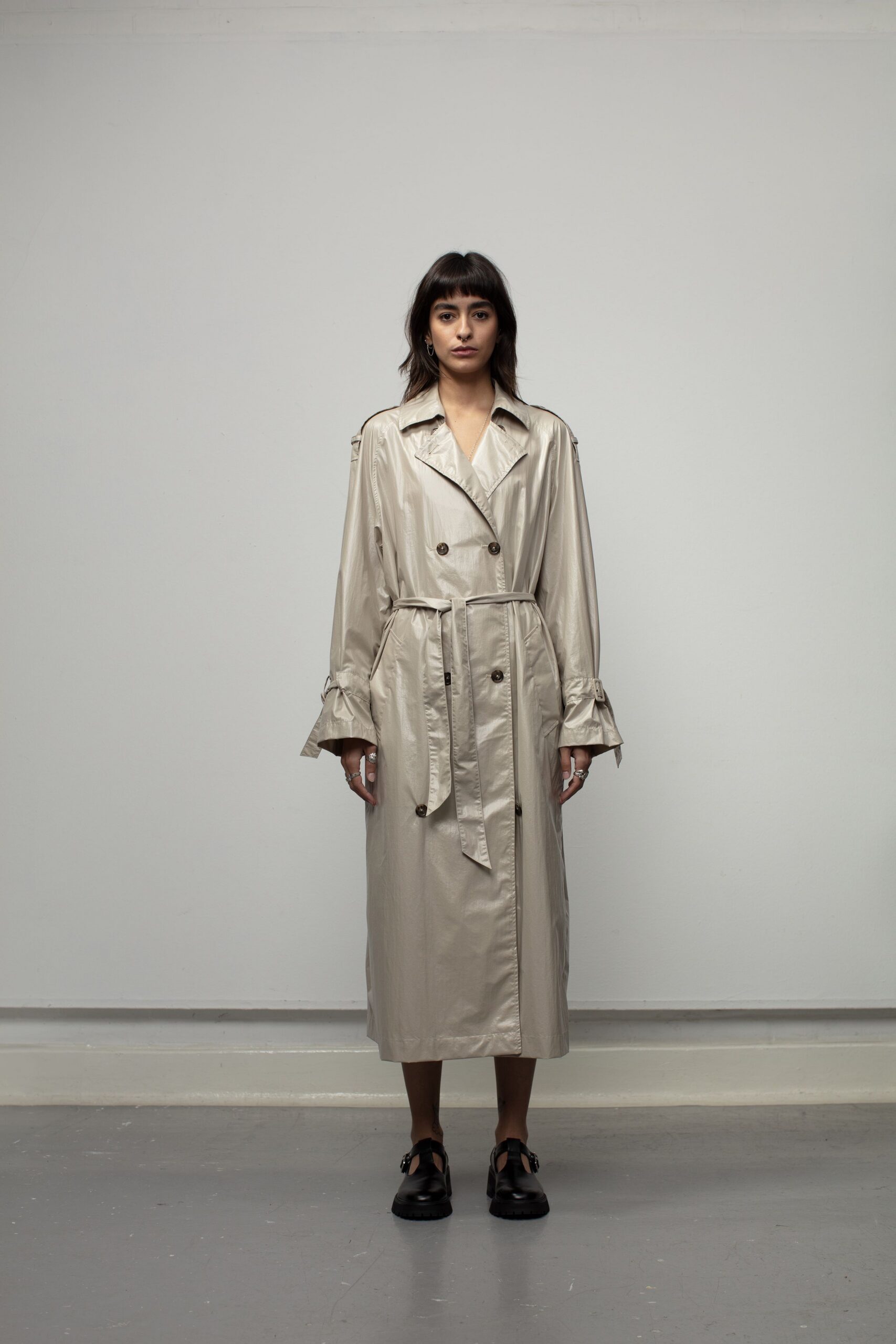 beige vinyl long-sleeve collared relaxed belted maxi trench