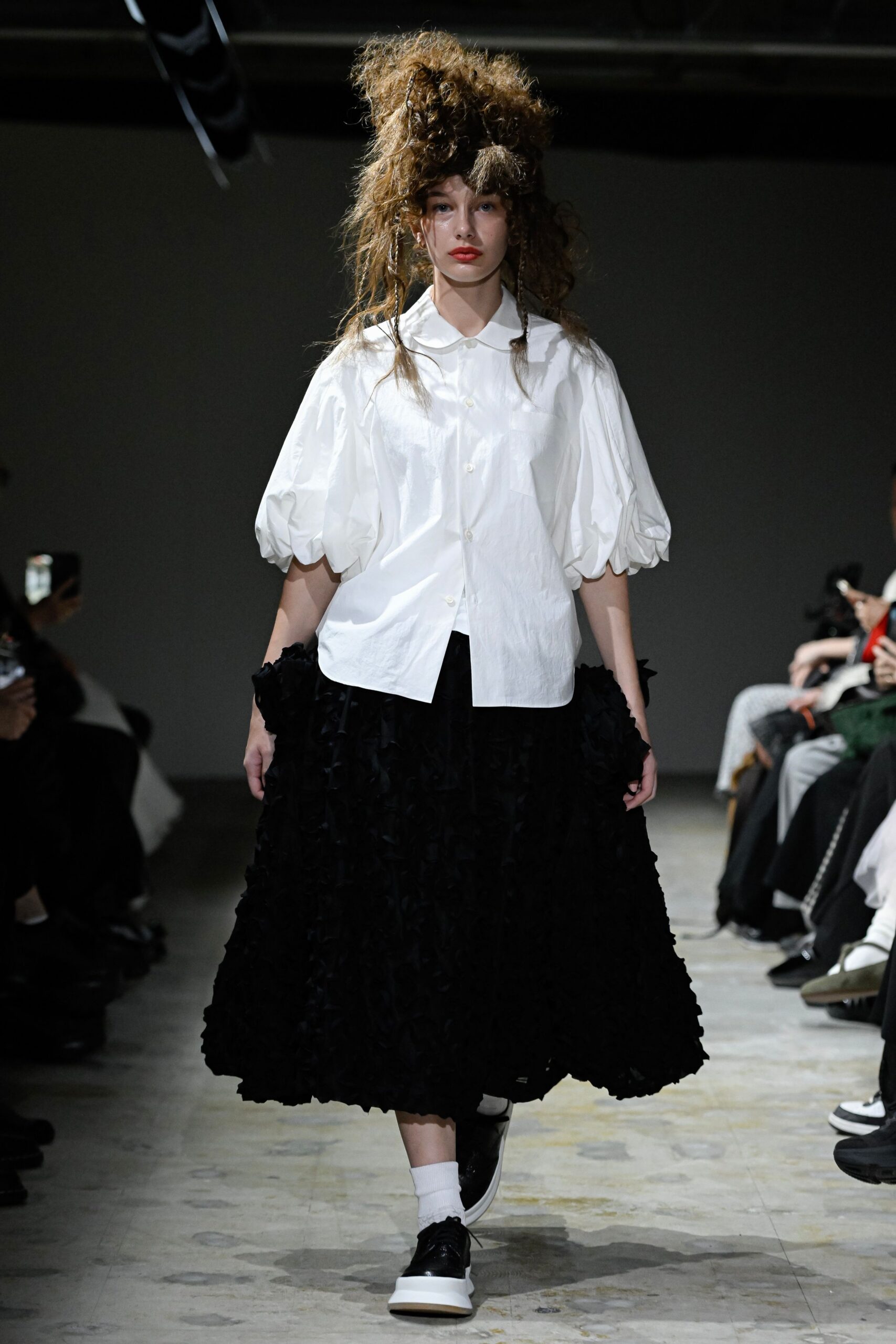 white relaxed shirt black midi skirt