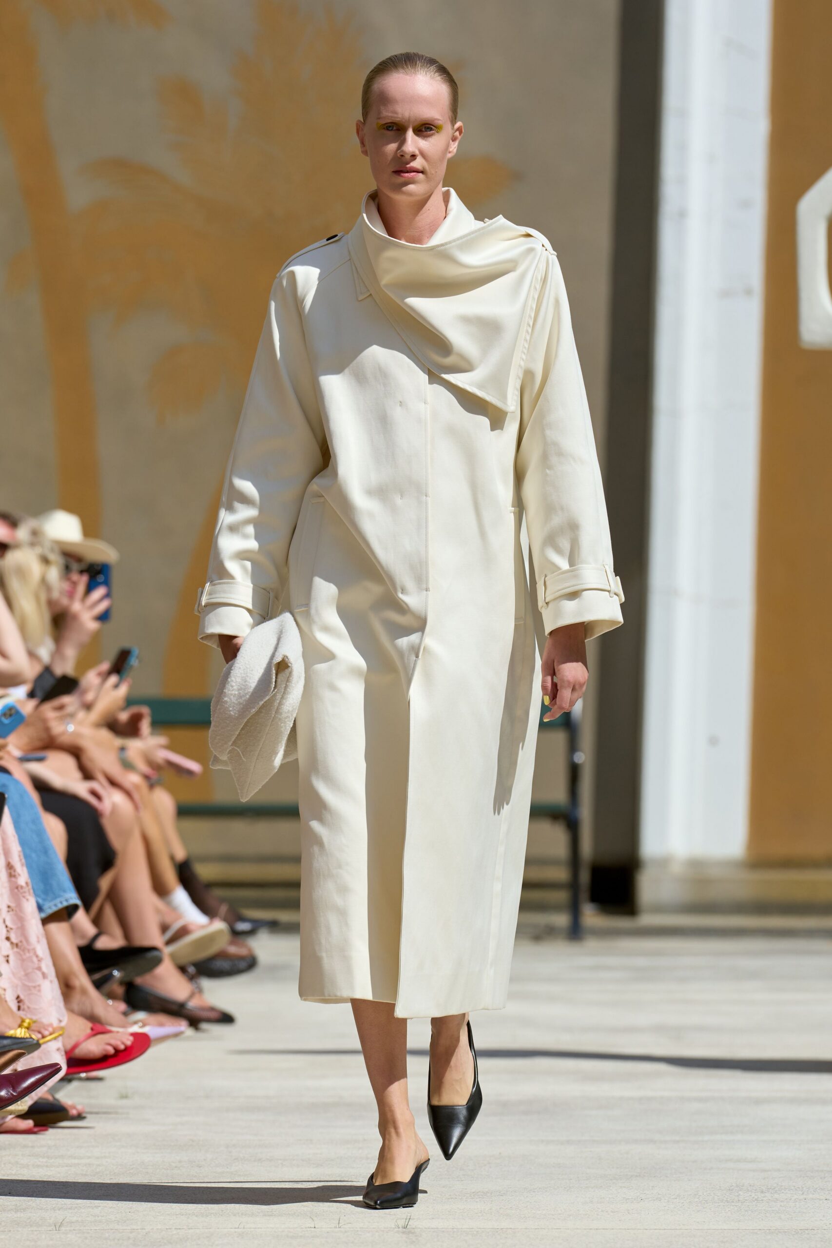 white relaxed coat with black shoes