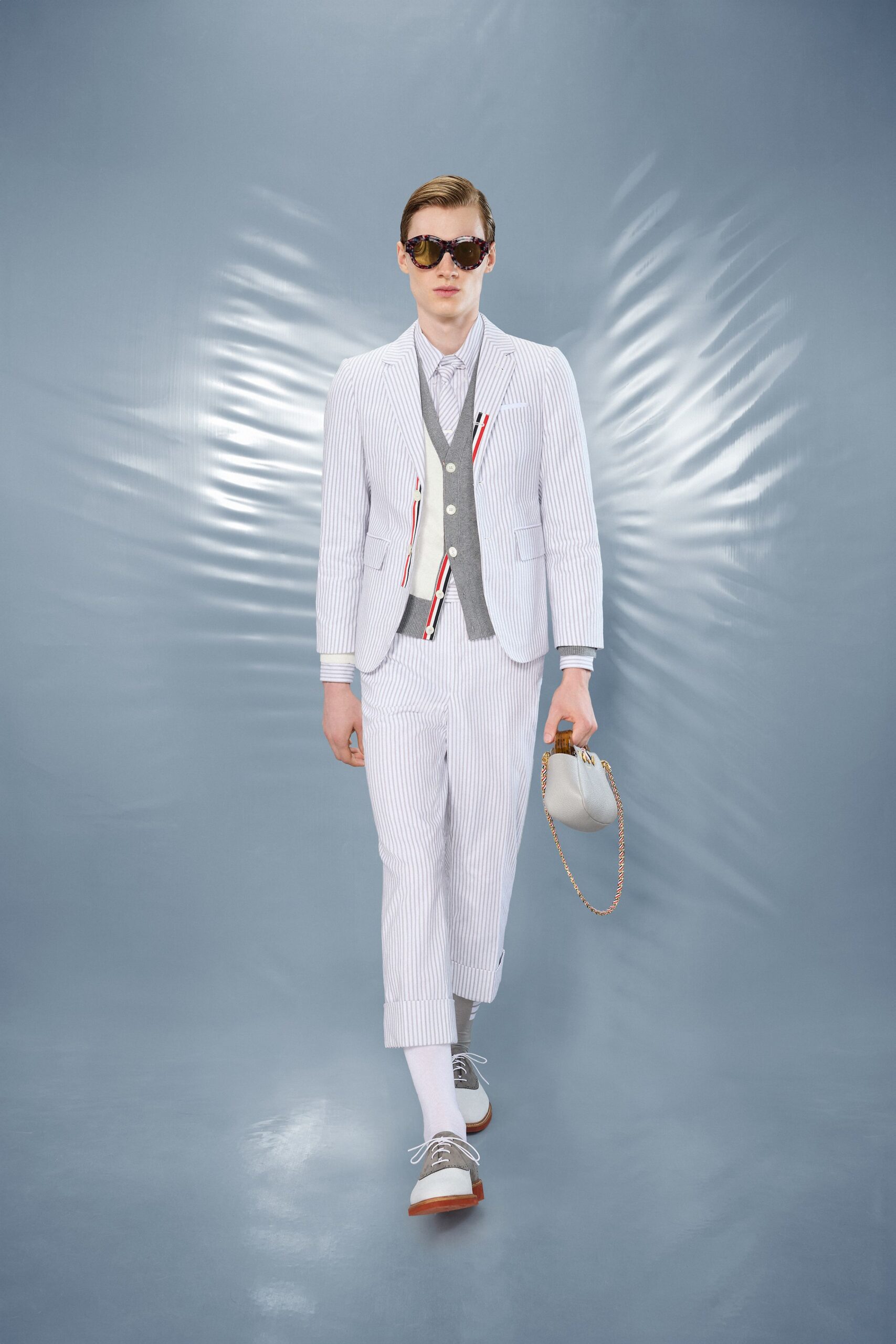striped tailored suit with gray vest