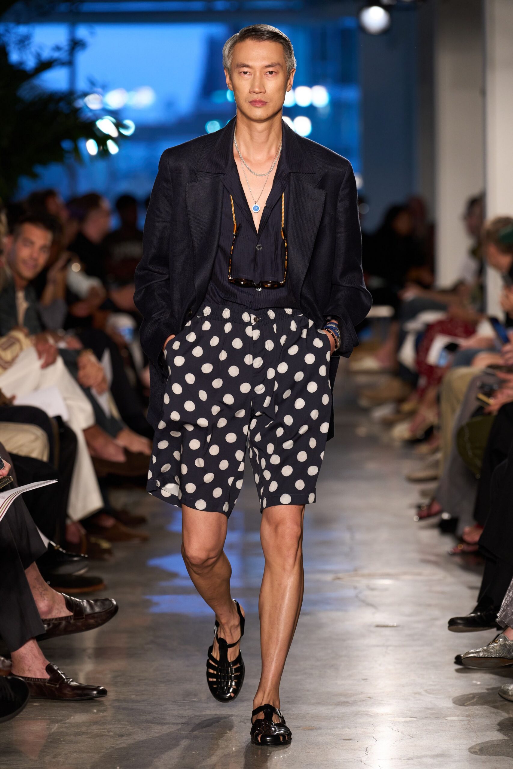 navy blazer with polka-dot shorts