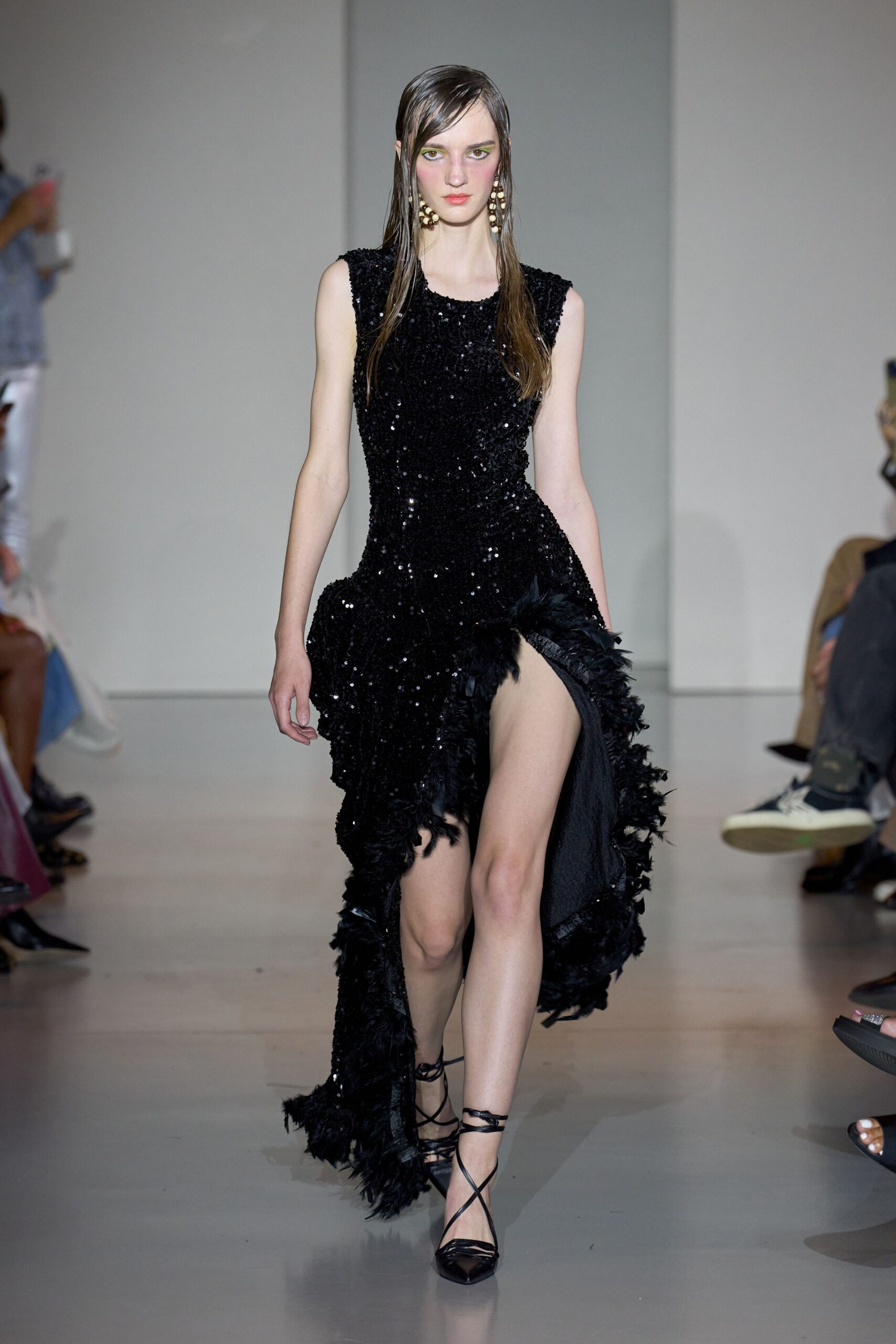 black sequin sleeveless v-neck fitted ruffled shiny gown