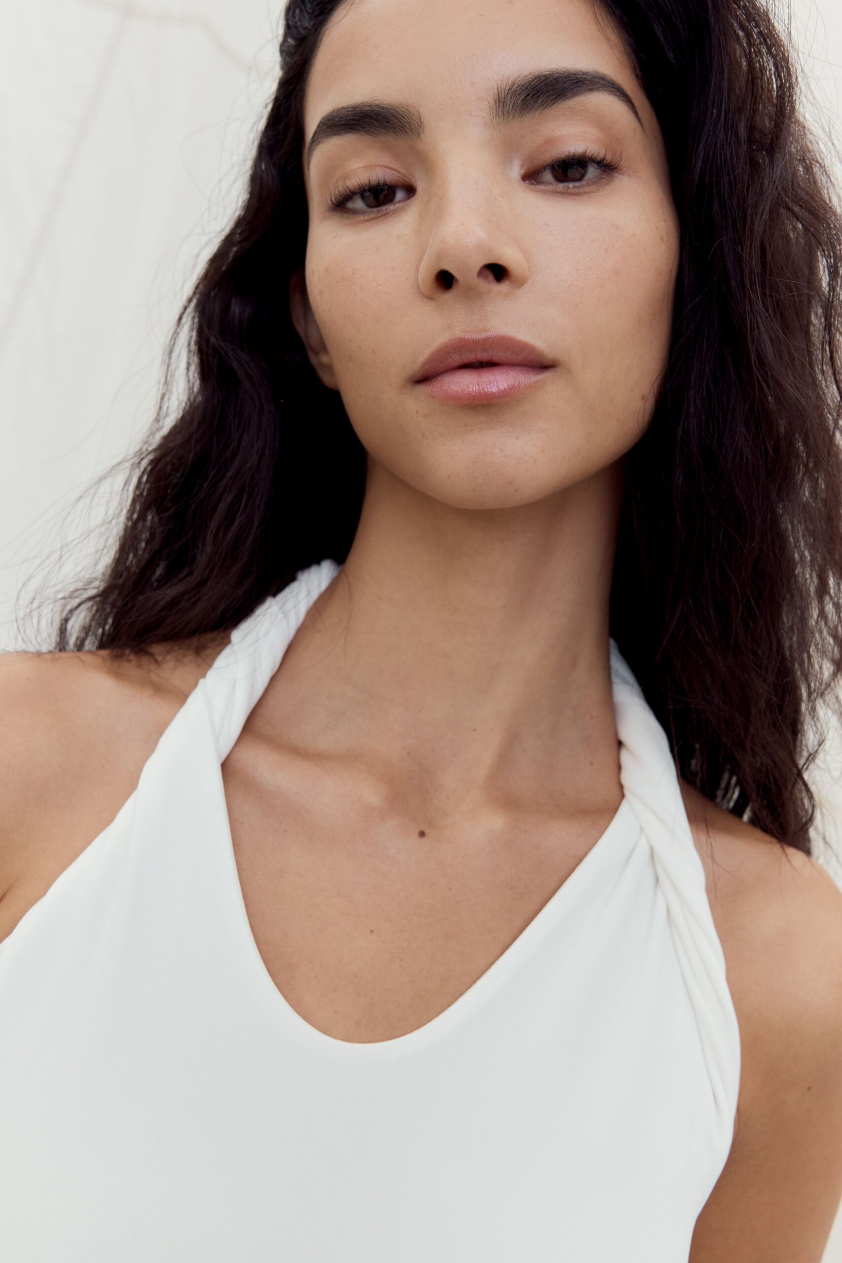 fitted white sleeveless top