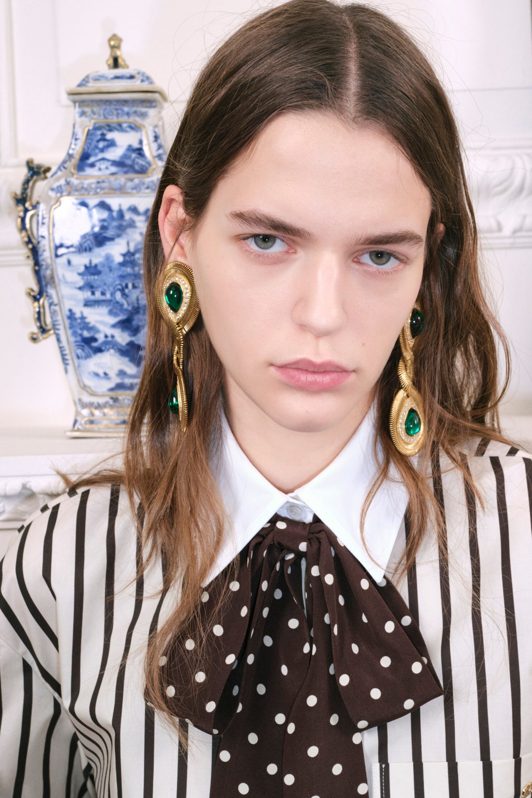 striped shirt with polka-dot tie